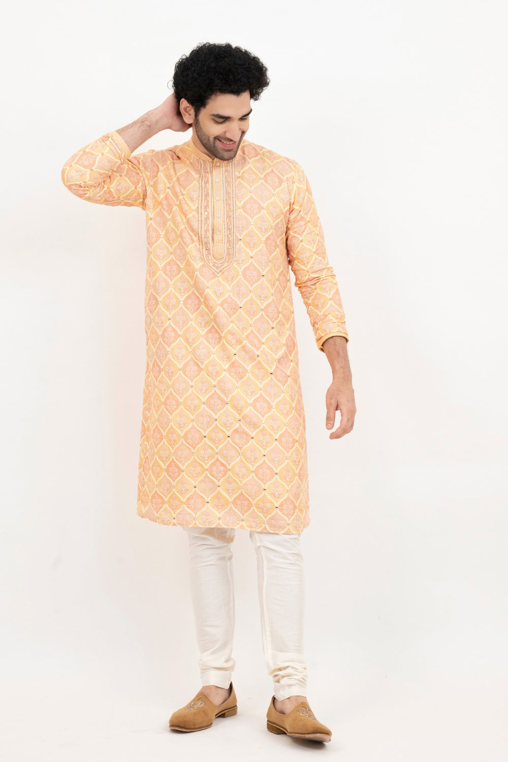 Light orange lucknowi position print kurta set with morror and thread work on yoke