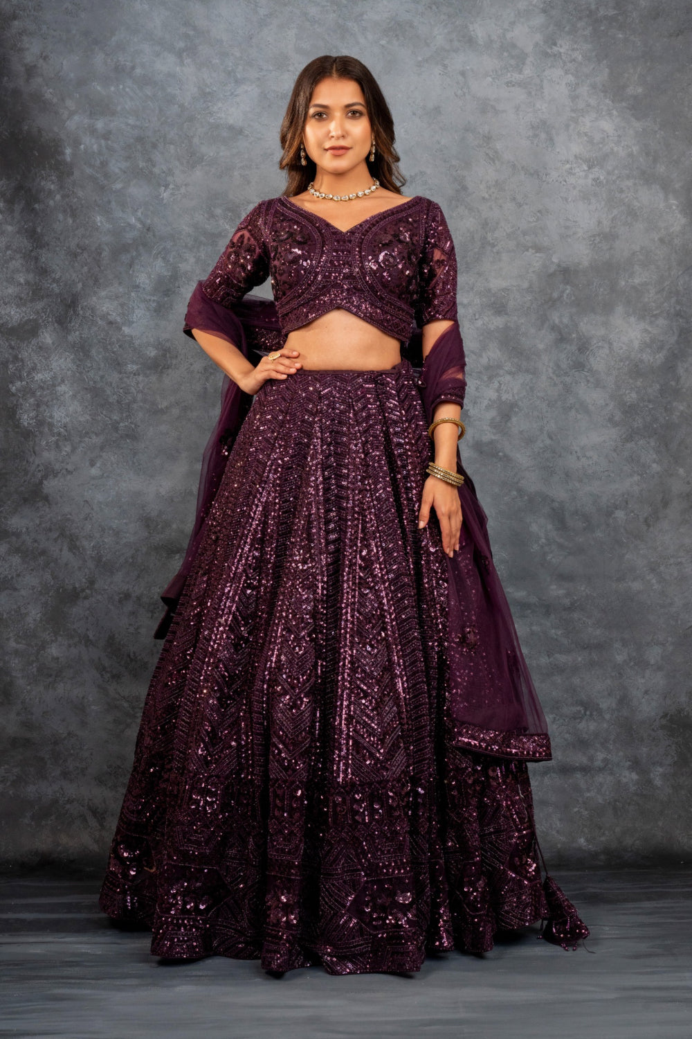Wine net lehenga choli with sequins, hand cut dana and dori work