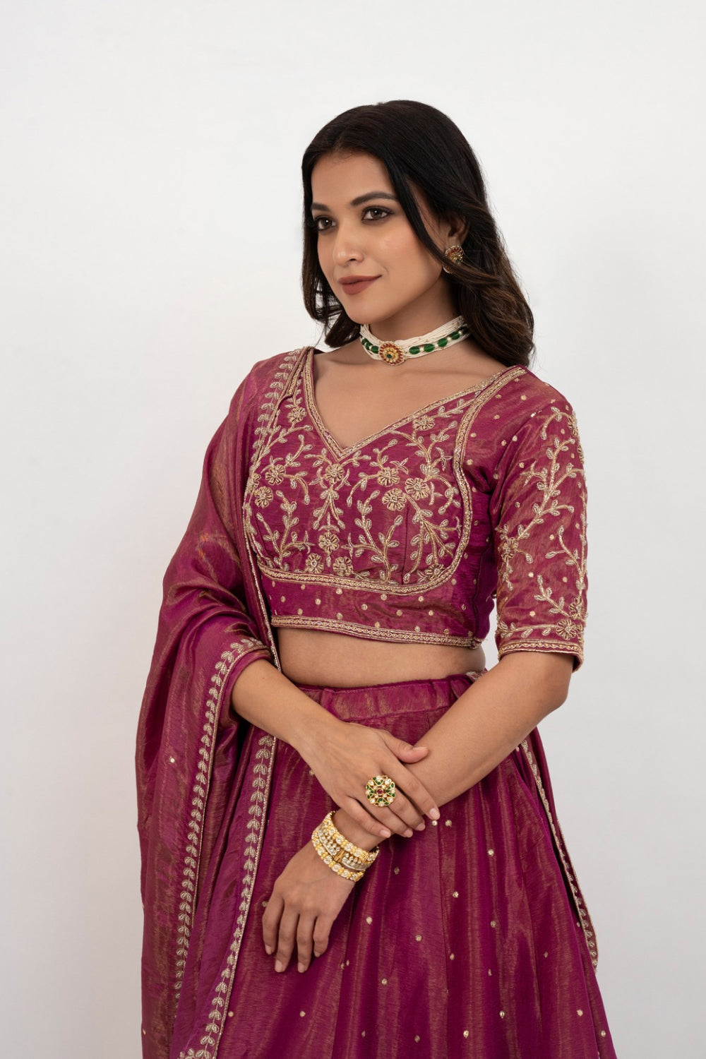 Magenta tissue silk zardozi embroidered lehenga choli with hand cut dana and beads work