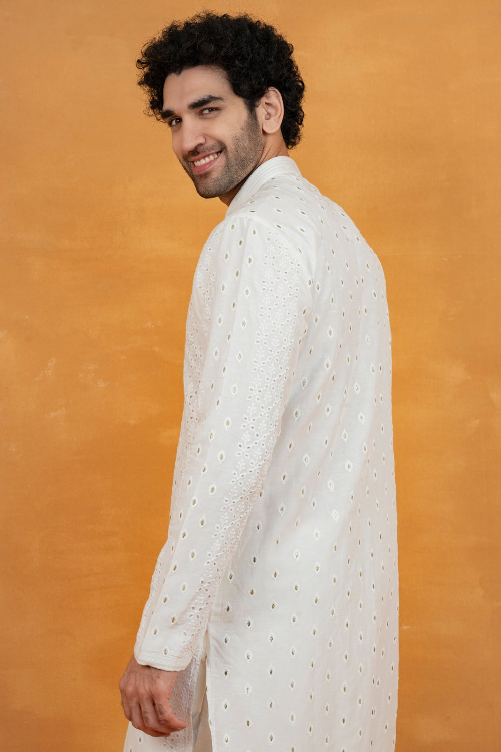 White silk kurta set with golden thread work