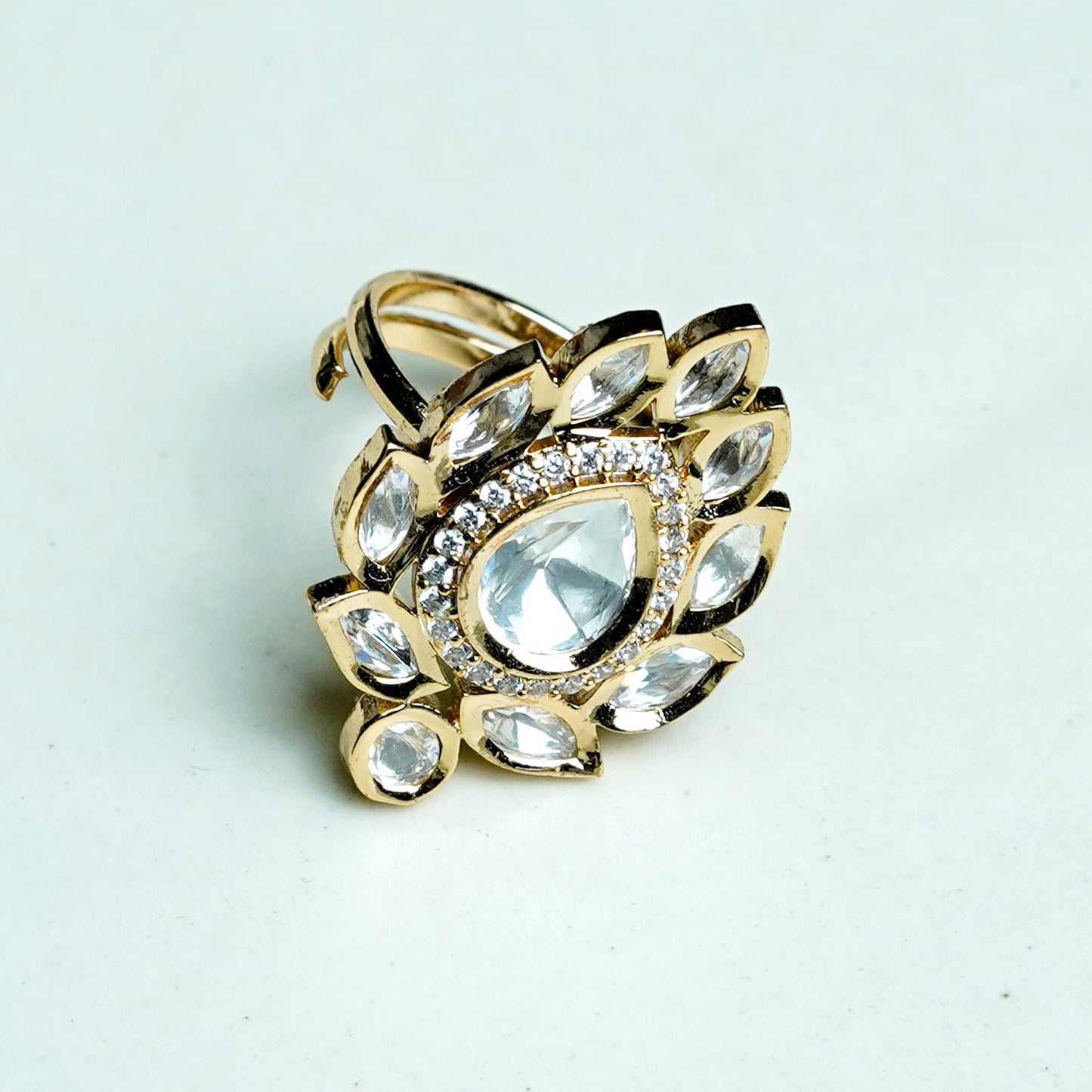 Zevar Club Gold-Toned White Kundan & Cubic Zirconia Studded Leaf Motif Adjustable Statement Ring