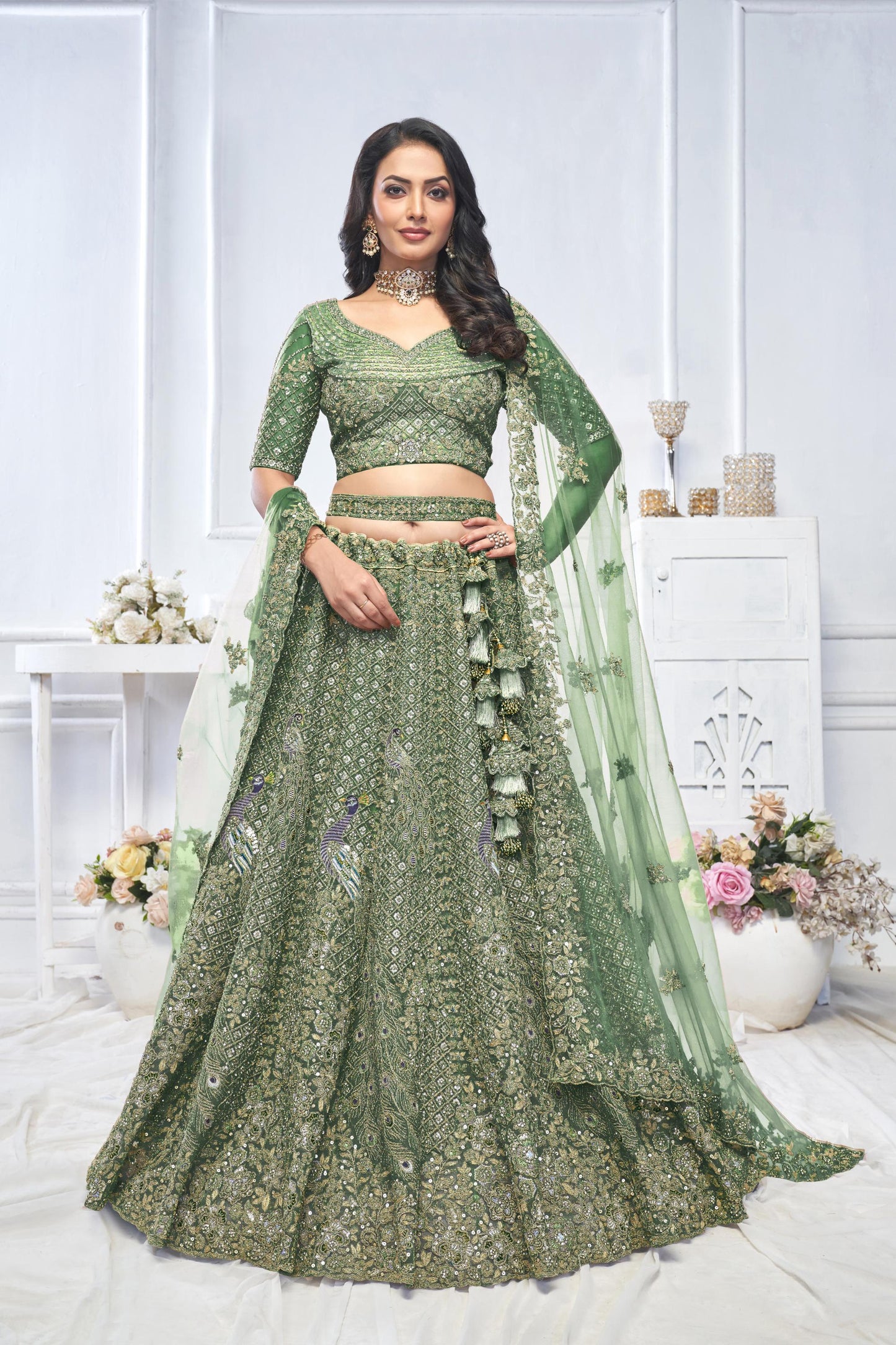 Green Heavy Sequins & Zari Embroidered Soft Net Bridal Wear Lehenga