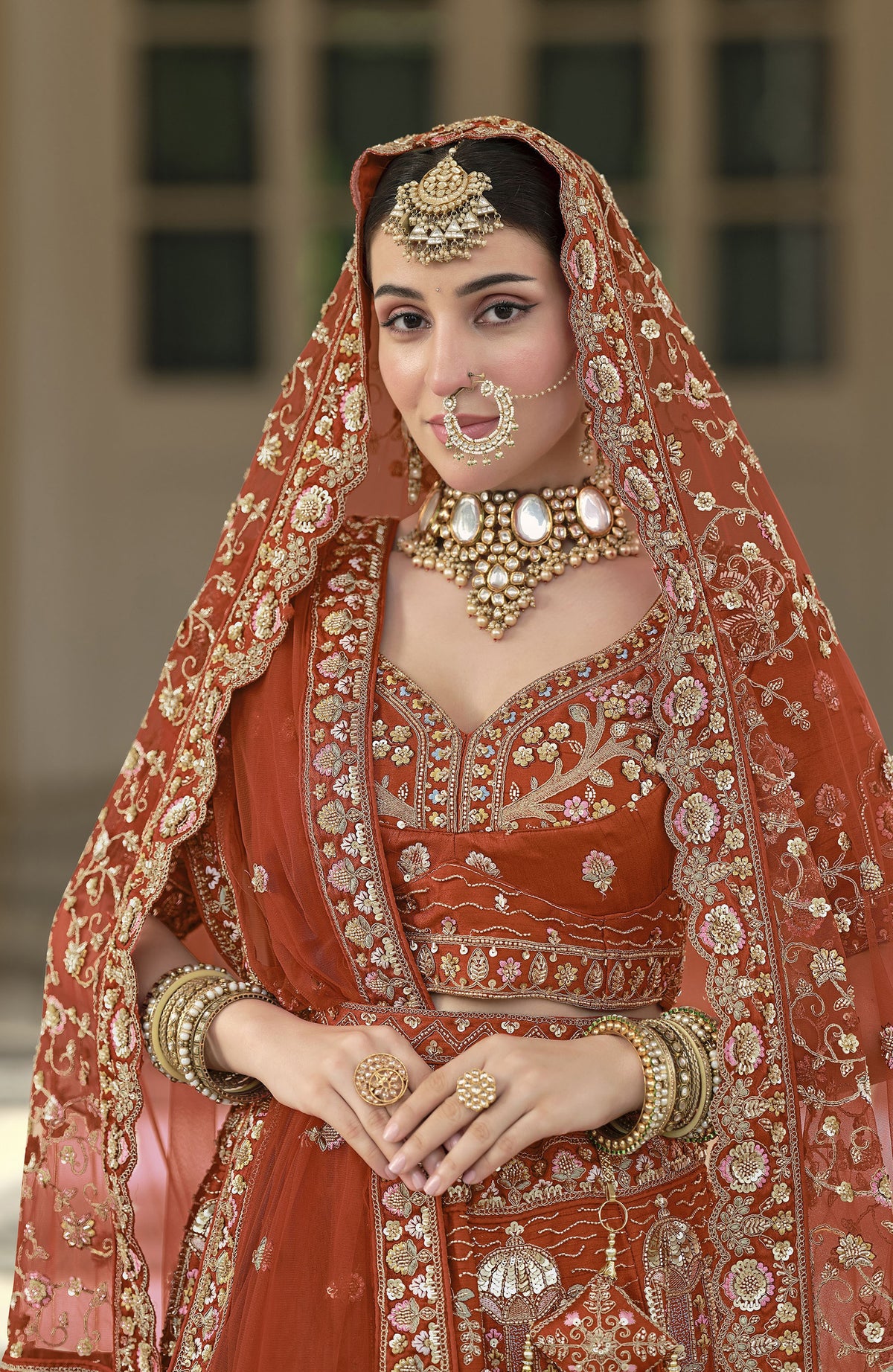Orange Silk Zardozi and Beads Multi Thread Embroidered Bridal Lehenga