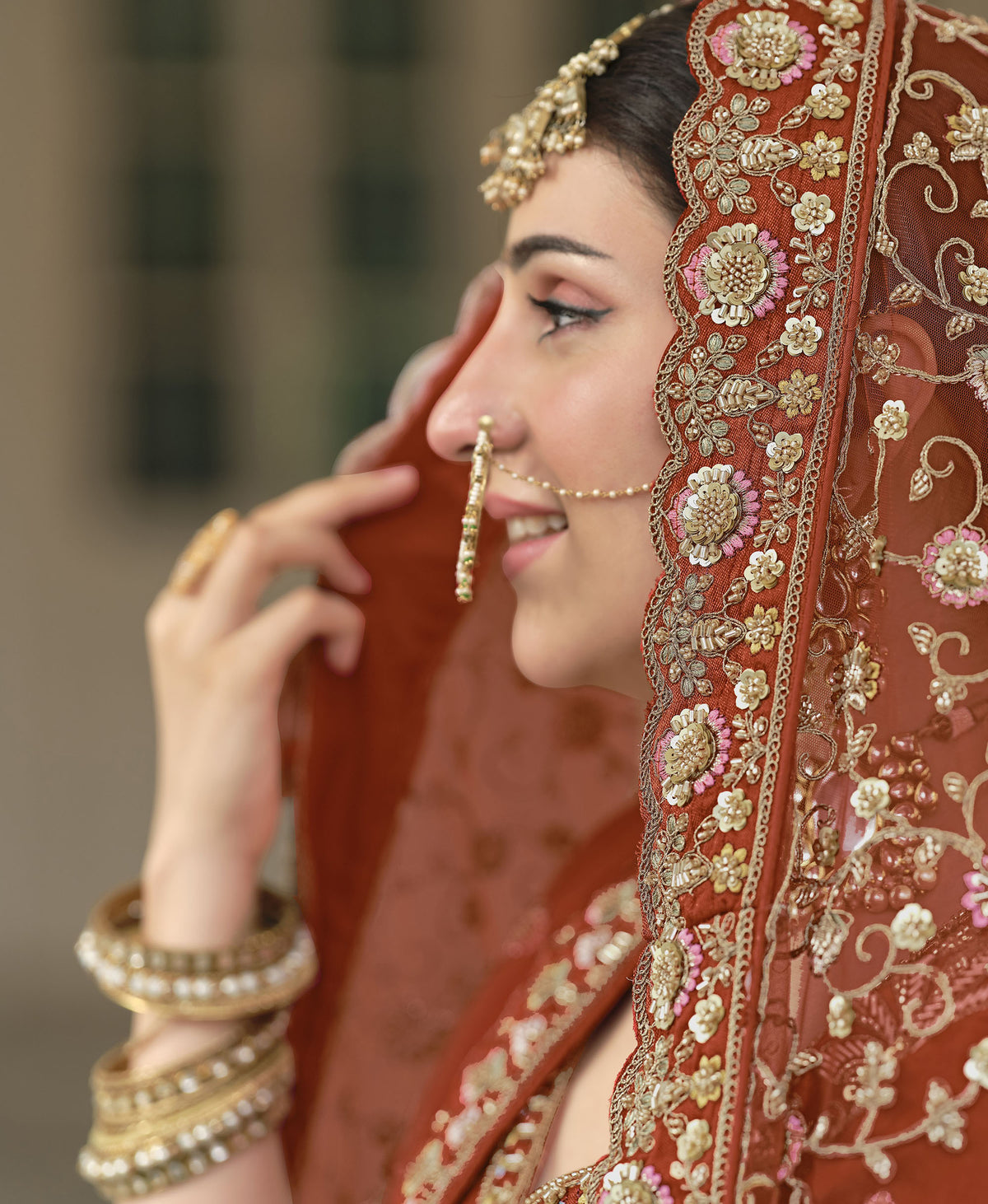 Orange Silk Zardozi and Beads Multi Thread Embroidered Bridal Lehenga