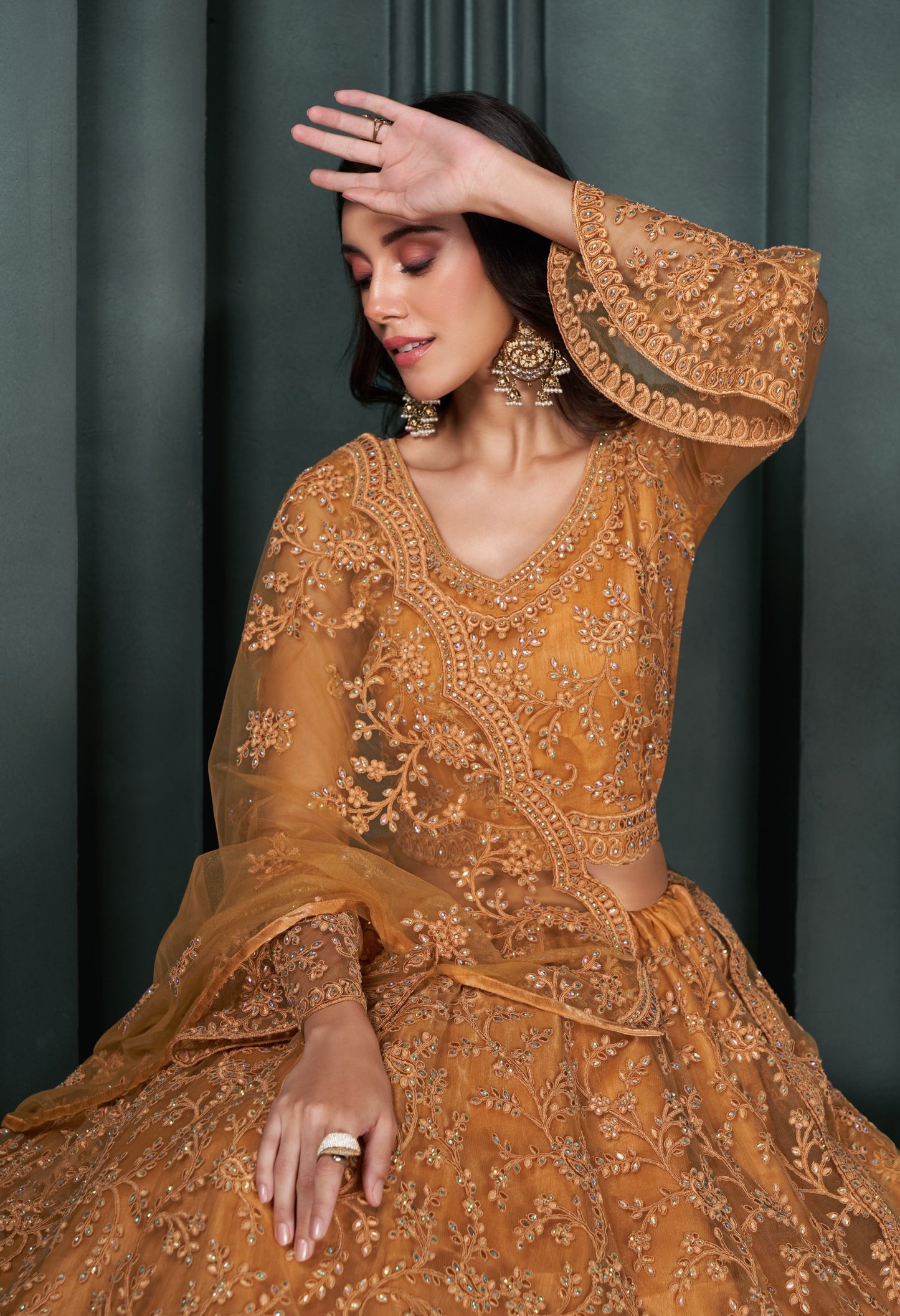 Orange Thread & Badla Embroidered Net Engagement Lehenga