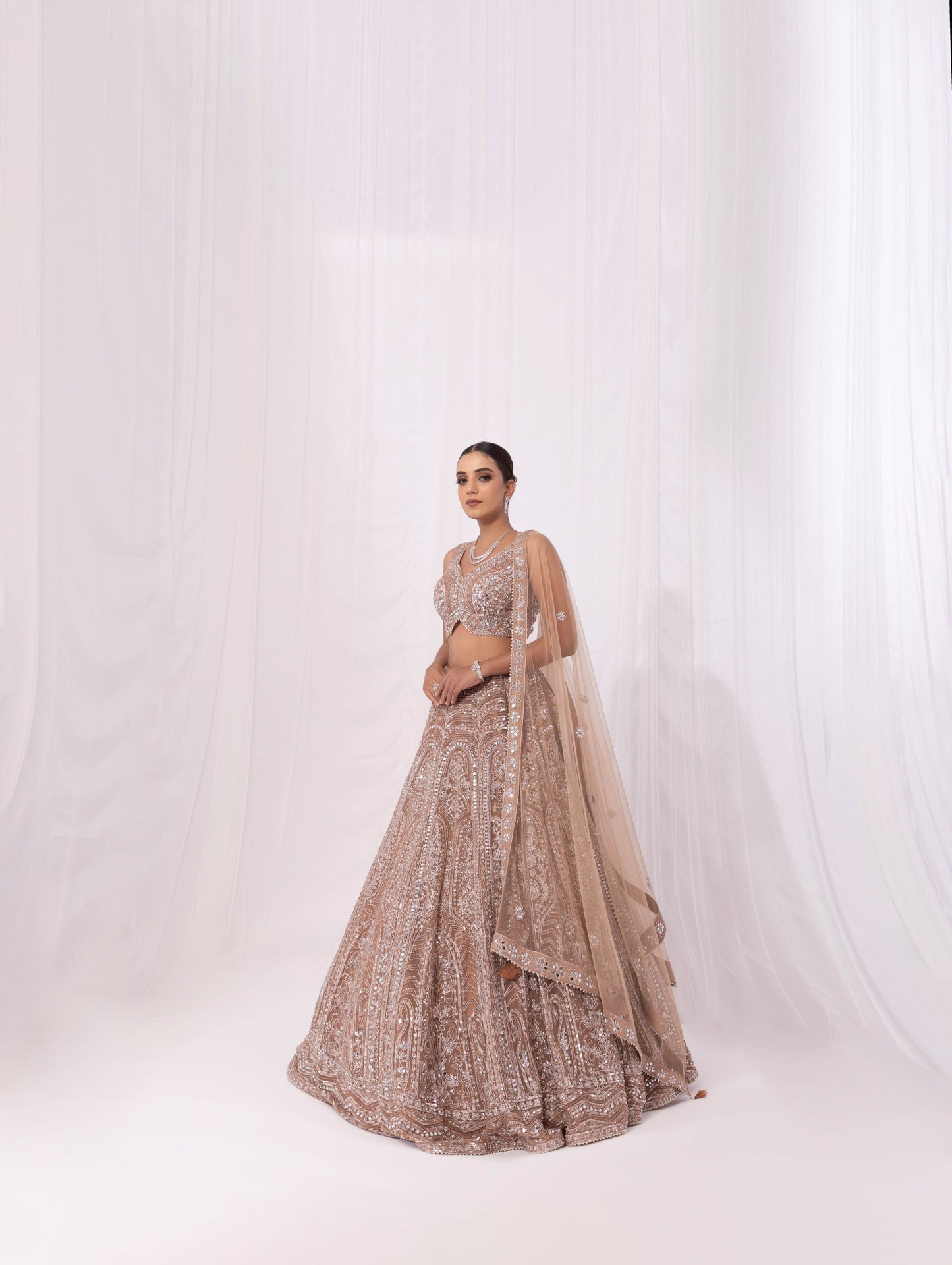 Champagne Net Heavy Hand & Mirror Embroidered Bridal Lehenga