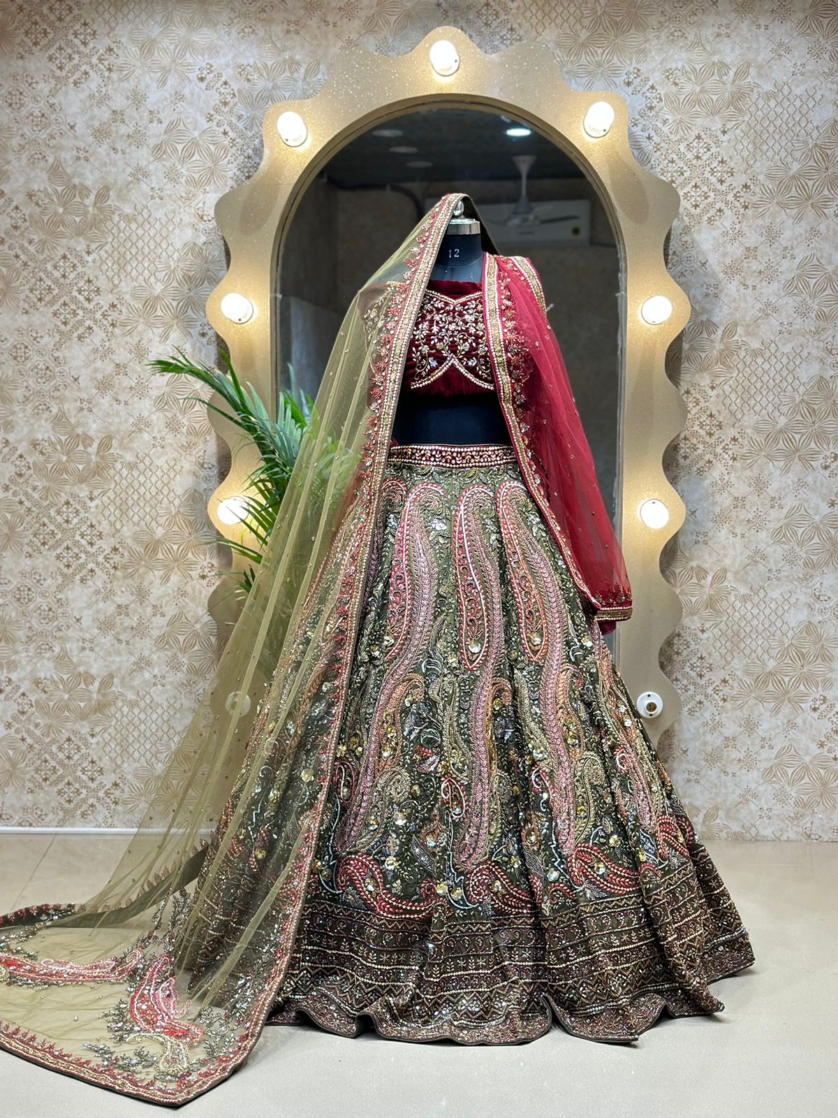 Crimson Red and Sea Green Micro Velvet Hand Embroidered Bridal Lehenga