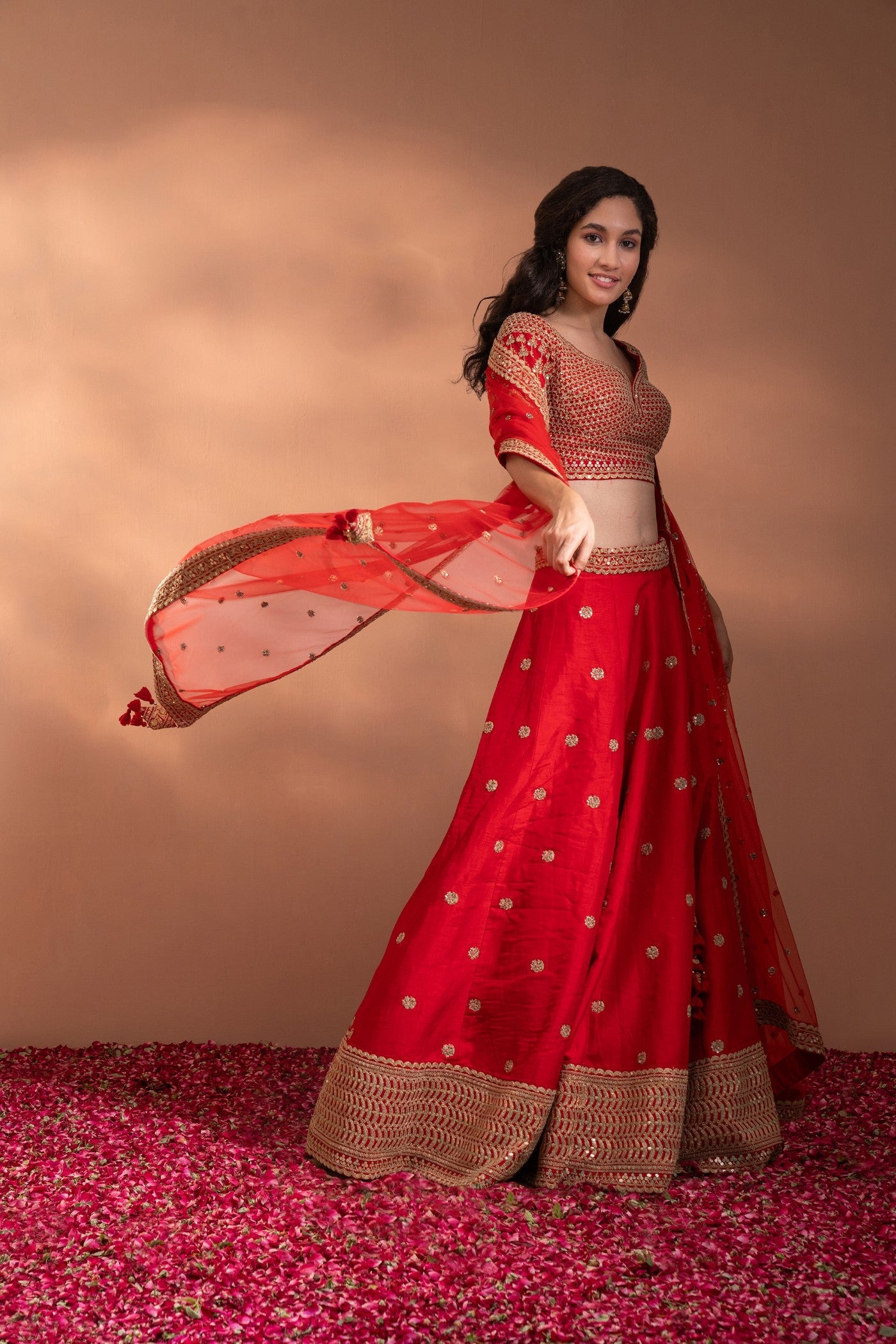 Bright Red Lehenga set in Silk with Heavy Gota & Embriodery Work.