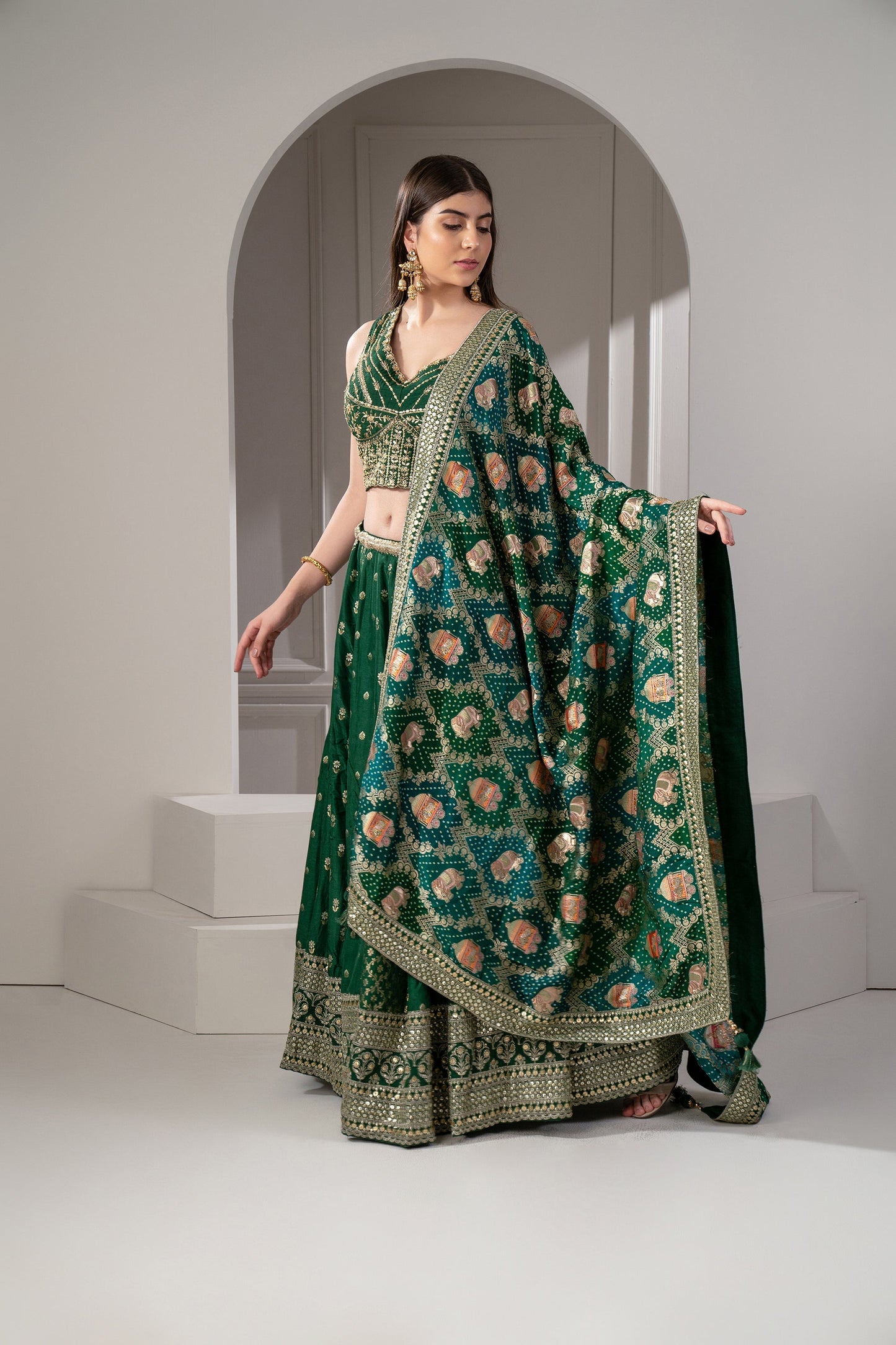 Castleton Green Sequins, Zari and Thread Embroidered Semi Silk Lehenga Set.