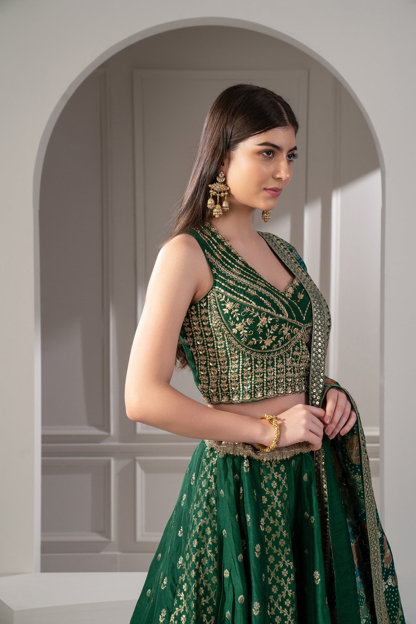Castleton Green Sequins, Zari and Thread Embroidered Semi Silk Lehenga Set.