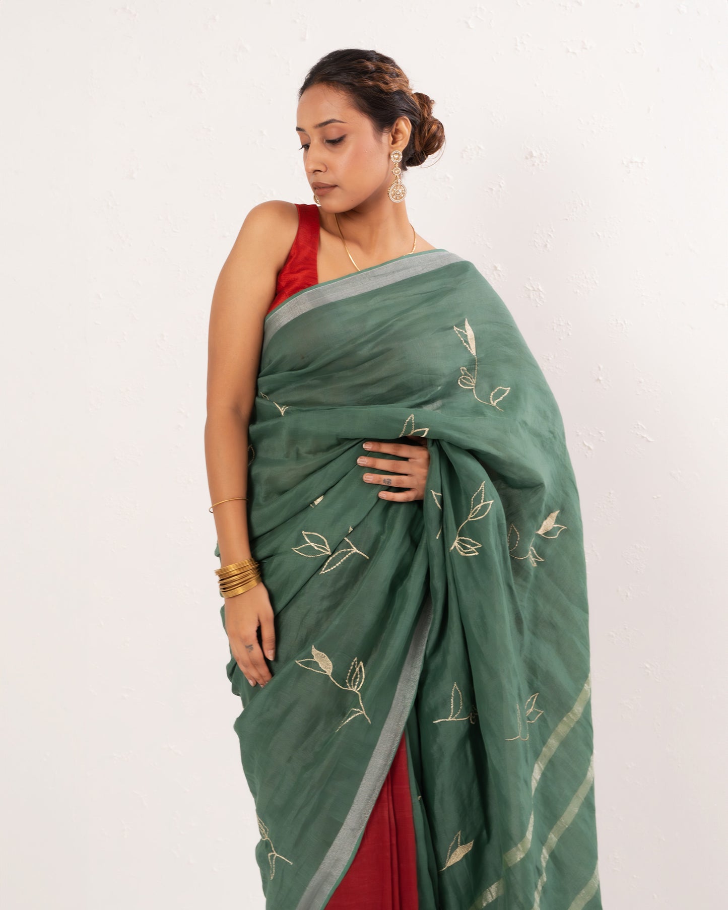 Green maroon embroidered handwoven linen saree
