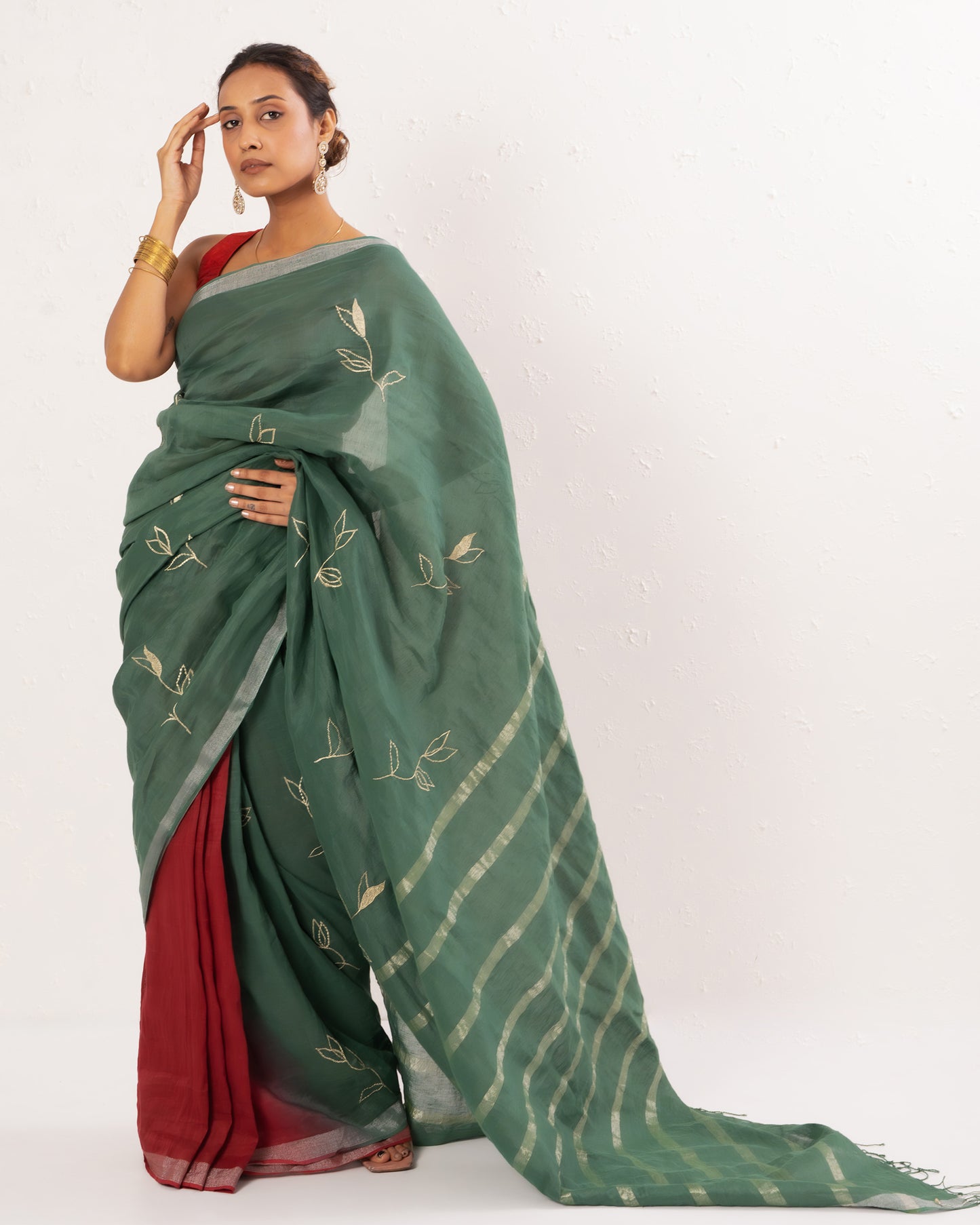 Green maroon embroidered handwoven linen saree