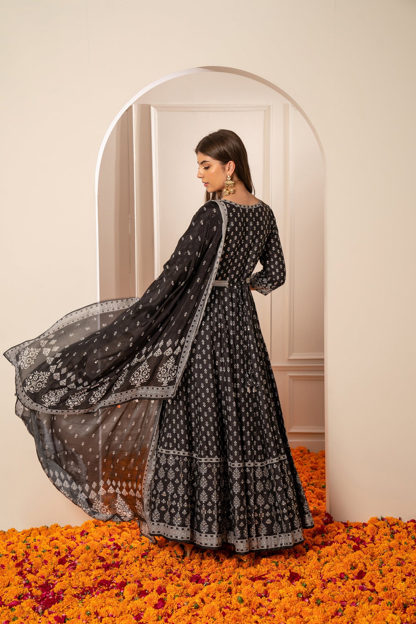 Charcoal Black Semi Silk Printed Gown with Mirror Embellishments.