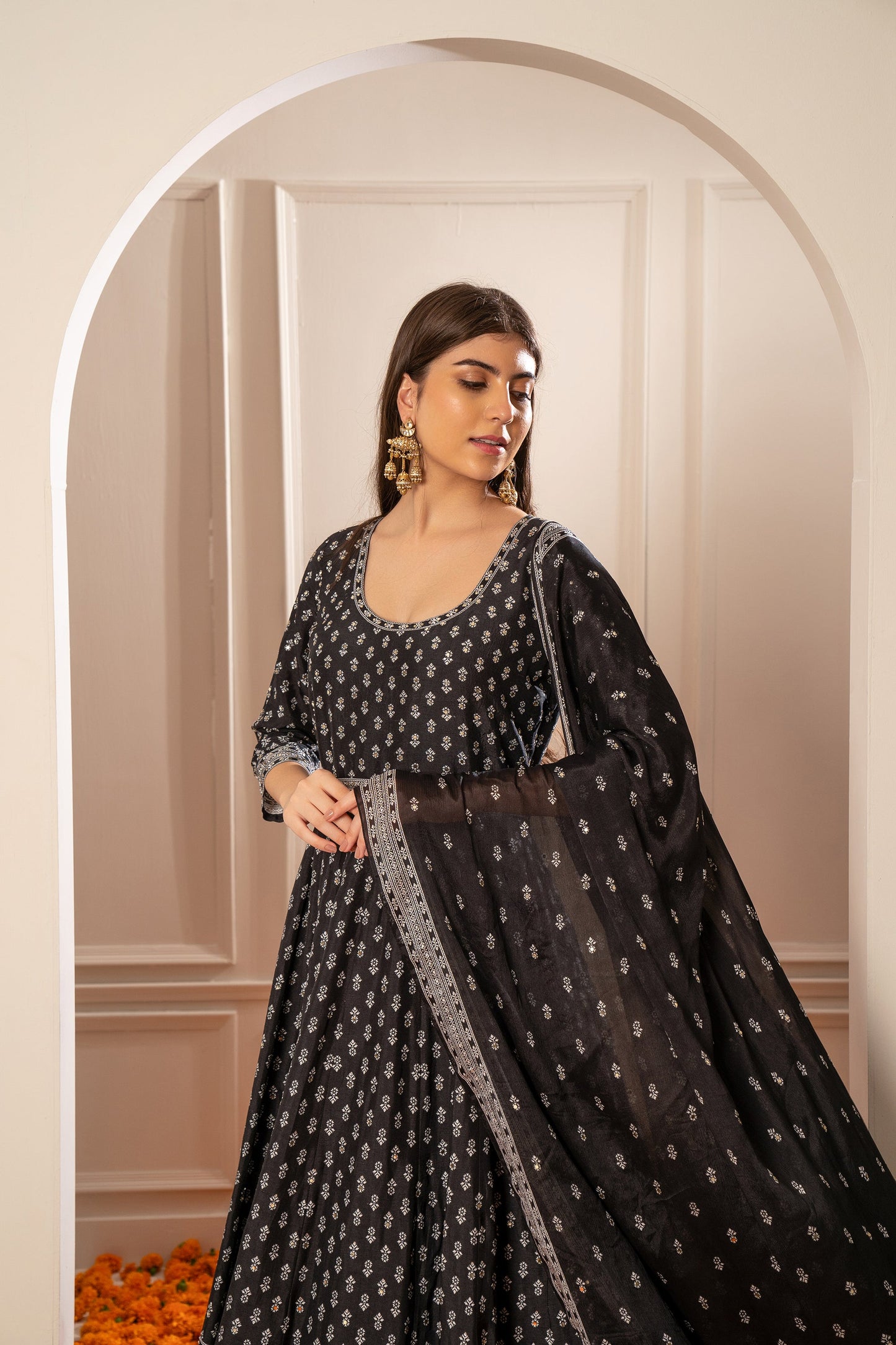 Charcoal Black Semi Silk Printed Gown with Mirror Embellishments.