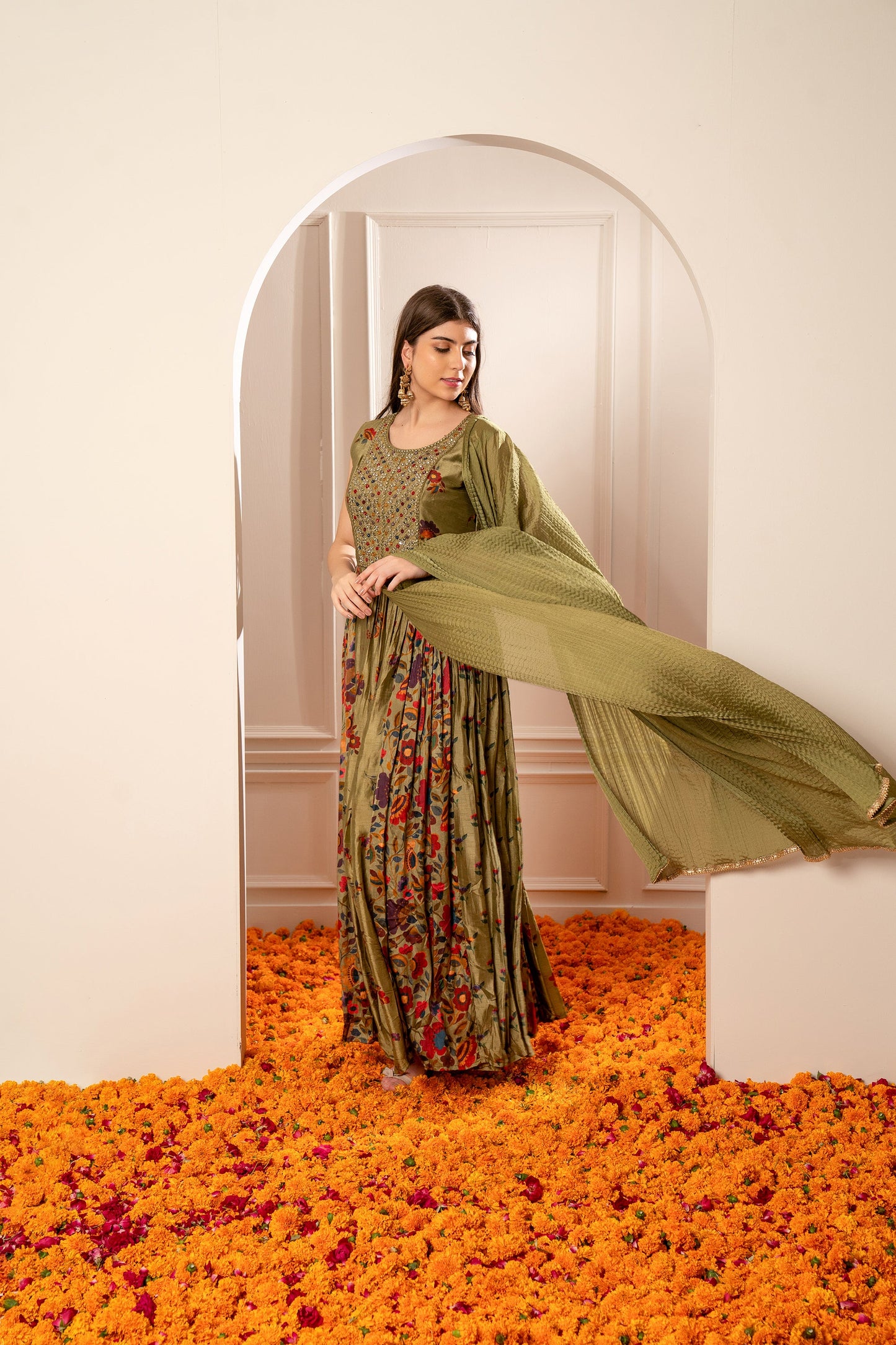 Mehendi Green Silk Gown with Mirror Embellishments.