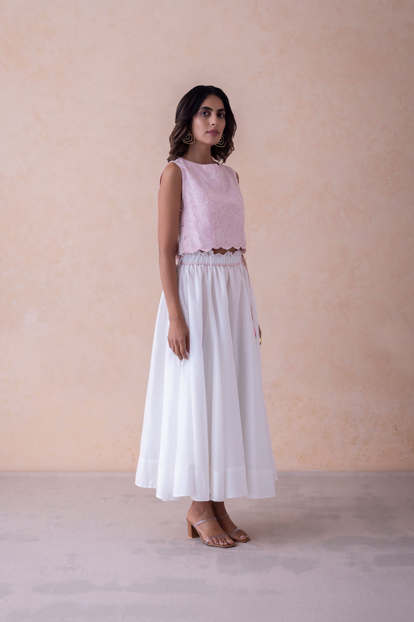 Misha Blush Schiffli Cropped Top & White Flared Skirt with Hand-Braided Belt