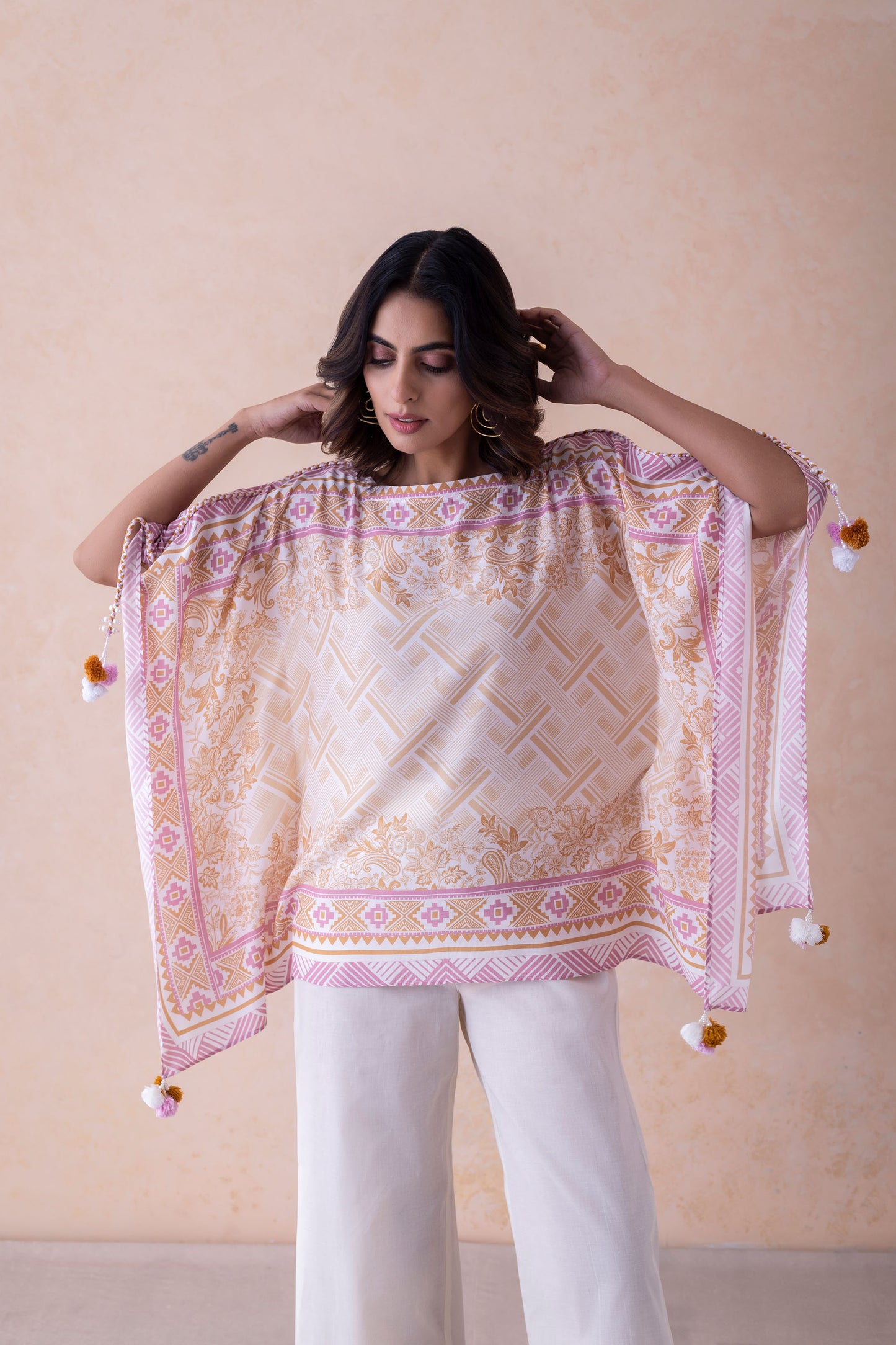 Ridhim Exquisite Bamber Muslin Tassel Embellished Kurti Top