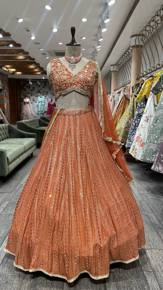 Rust Chinnon Lehenga With Pearl Sequins & Pot Embellishments