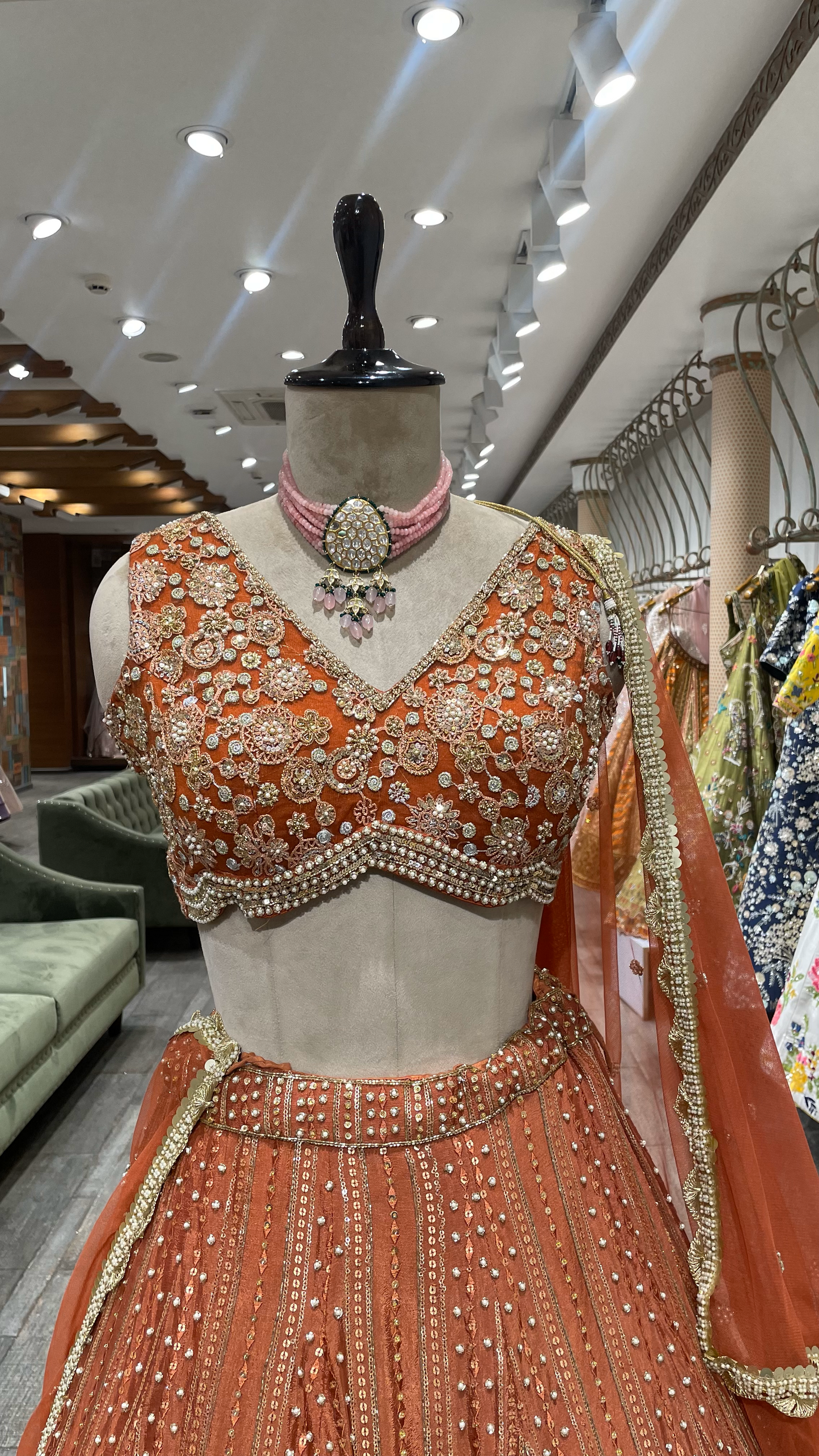 Rust Chinnon Lehenga With Pearl Sequins & Pot Embellishments