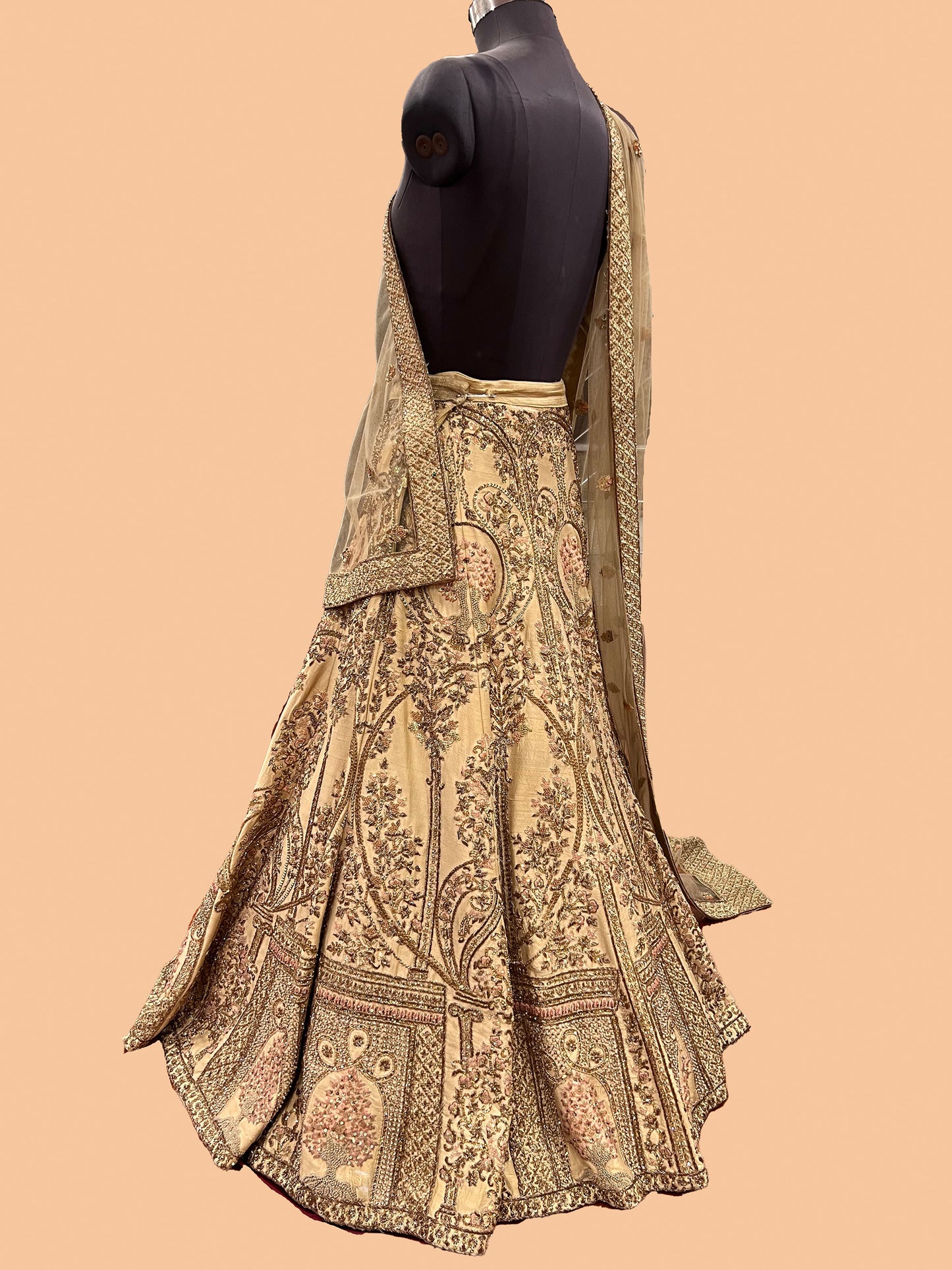 Golden colored Hand embroidered Raw Silk resham bridal lehenga
