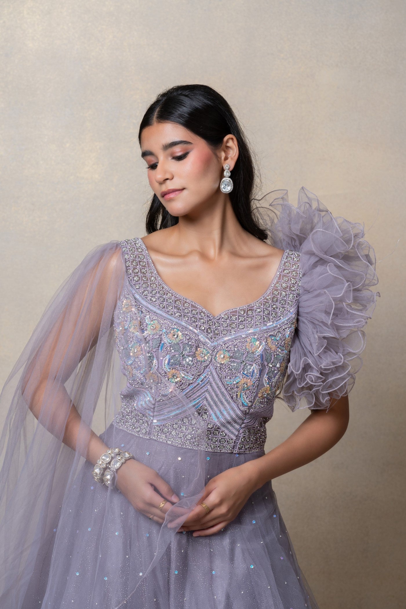 Platinum grey sequinned net gown