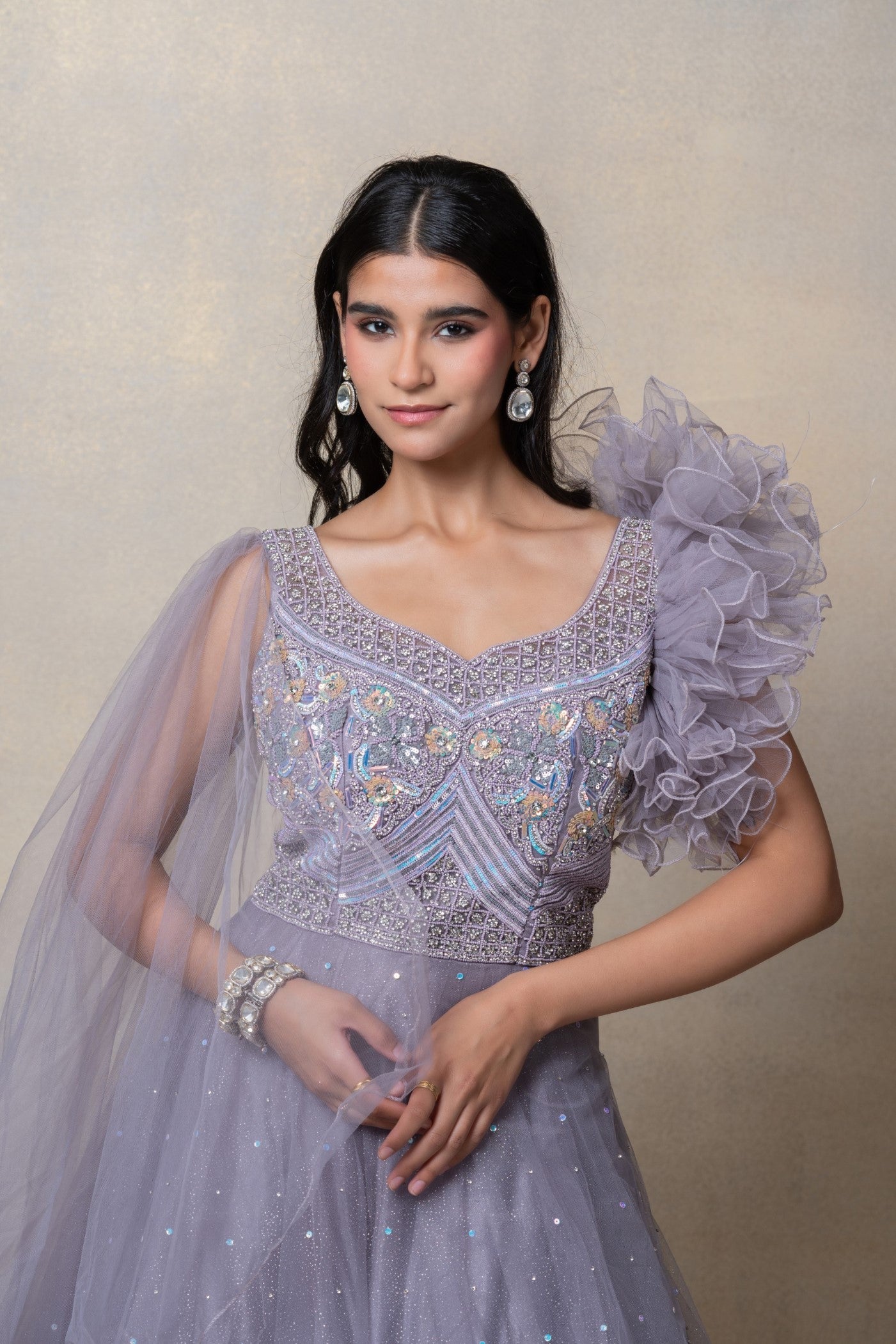 Platinum grey sequinned net gown