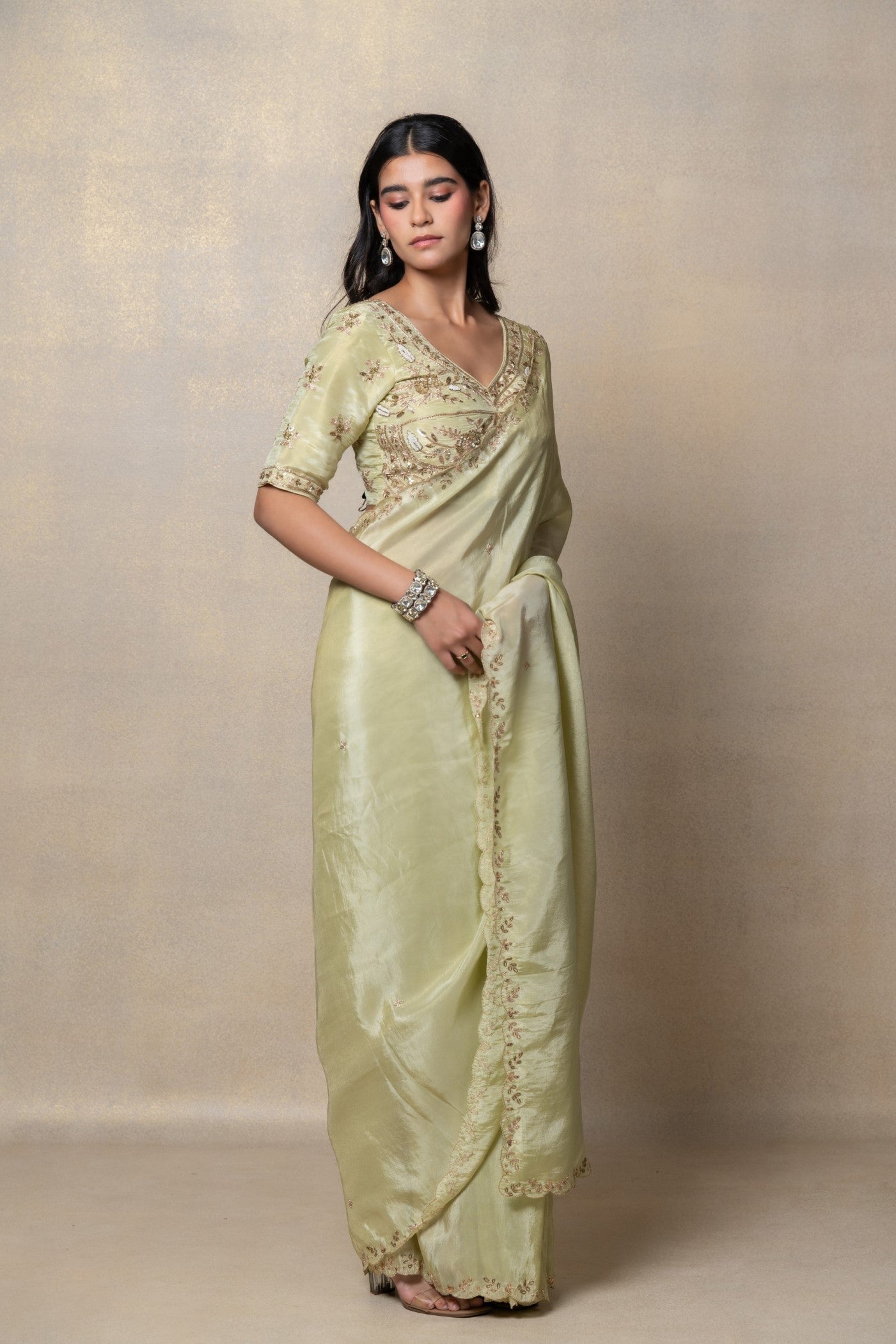 Pista green silk saree with zari embroidery