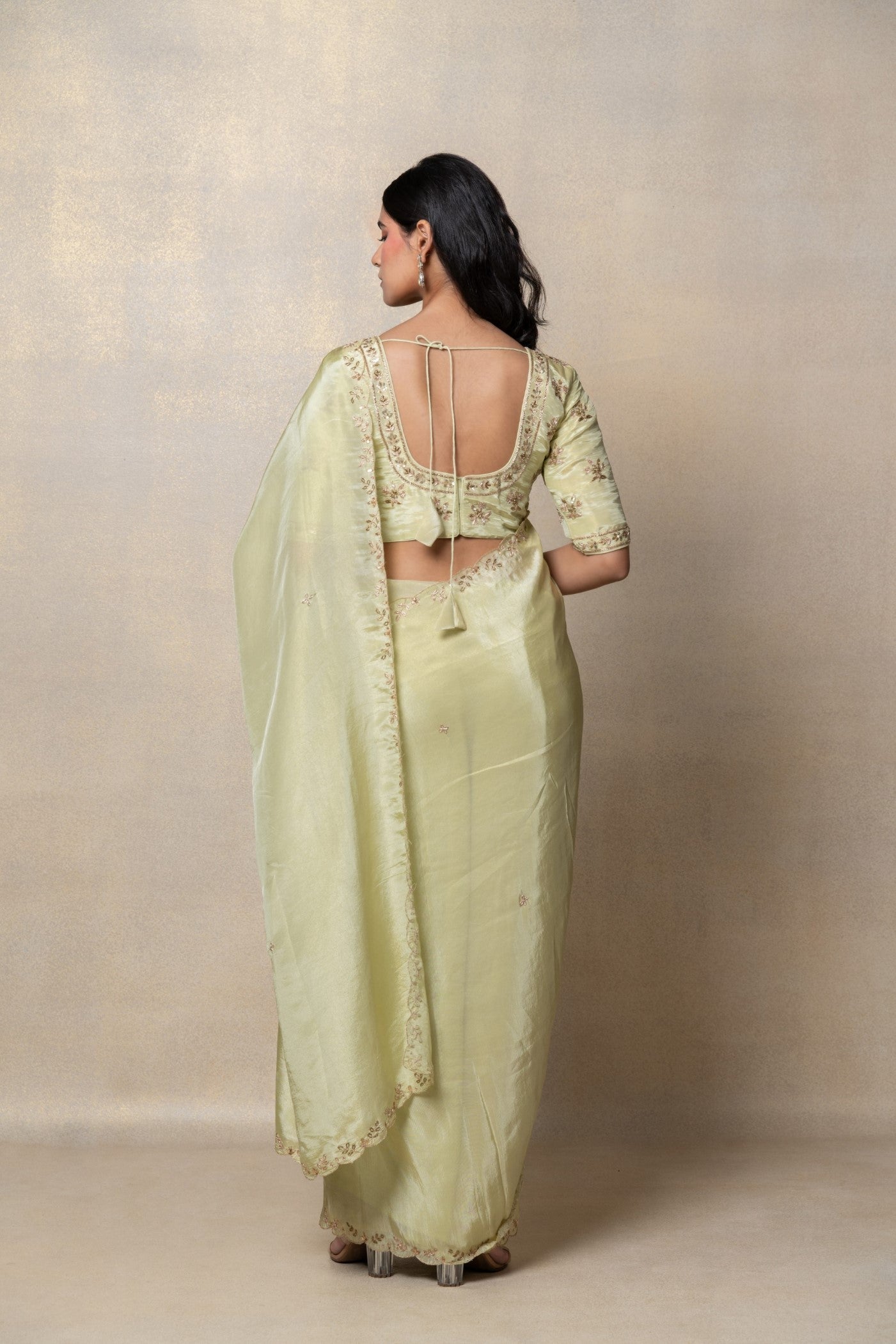 Pista green silk saree with zari embroidery