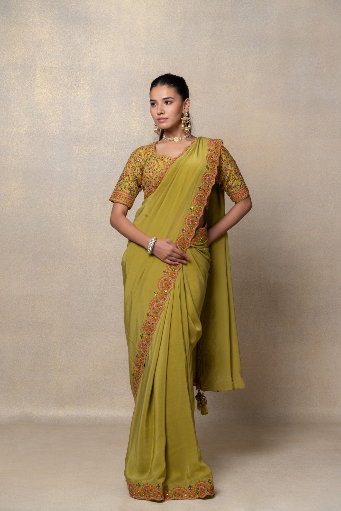 Mehendi green crepe silk resham and mirror embellished saree