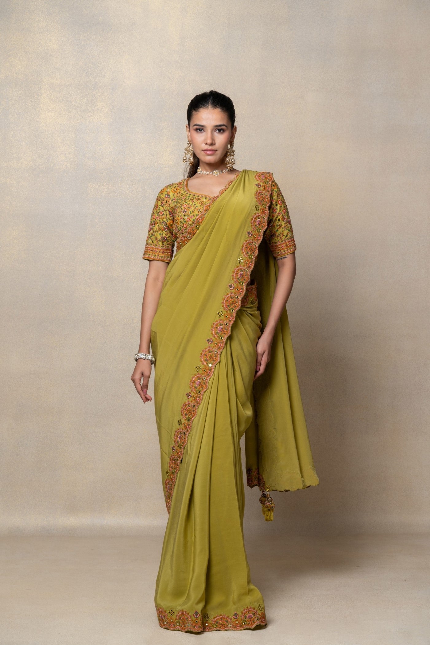Mehendi green crepe silk resham and mirror embellished saree