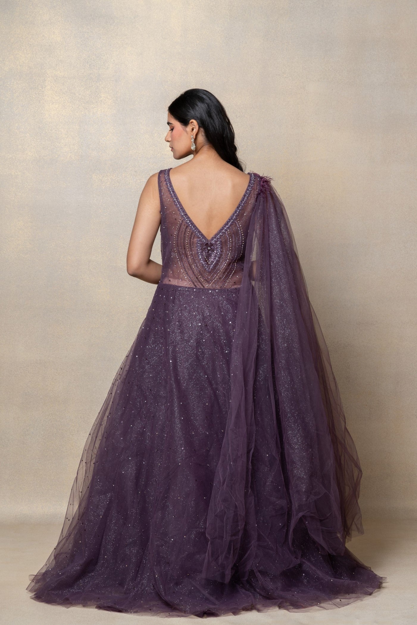 Violet purple sequinned net gown