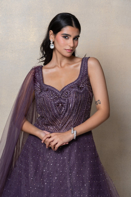 Violet purple sequinned net gown