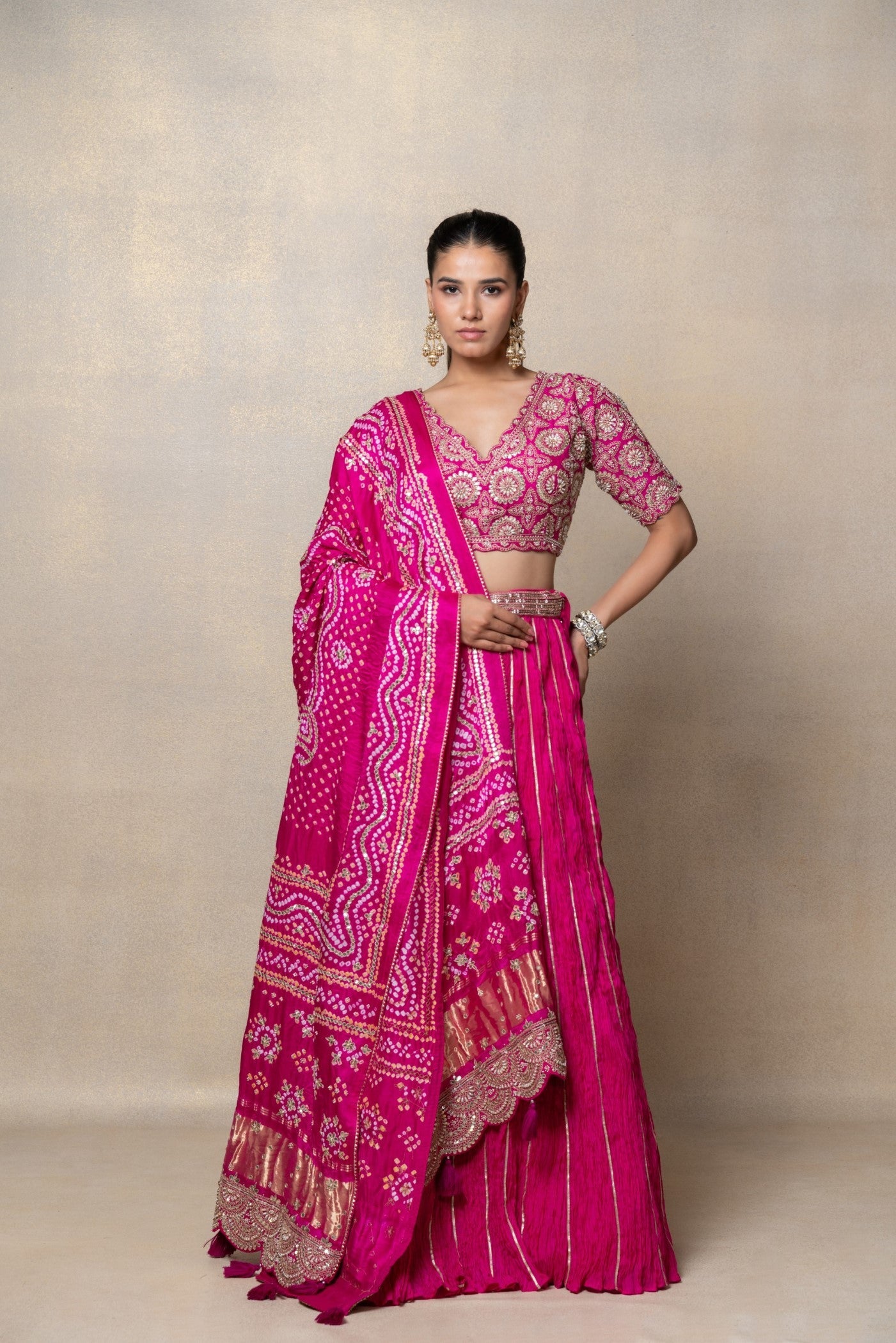 Magenta pink sequinned crepe silk lehenga set