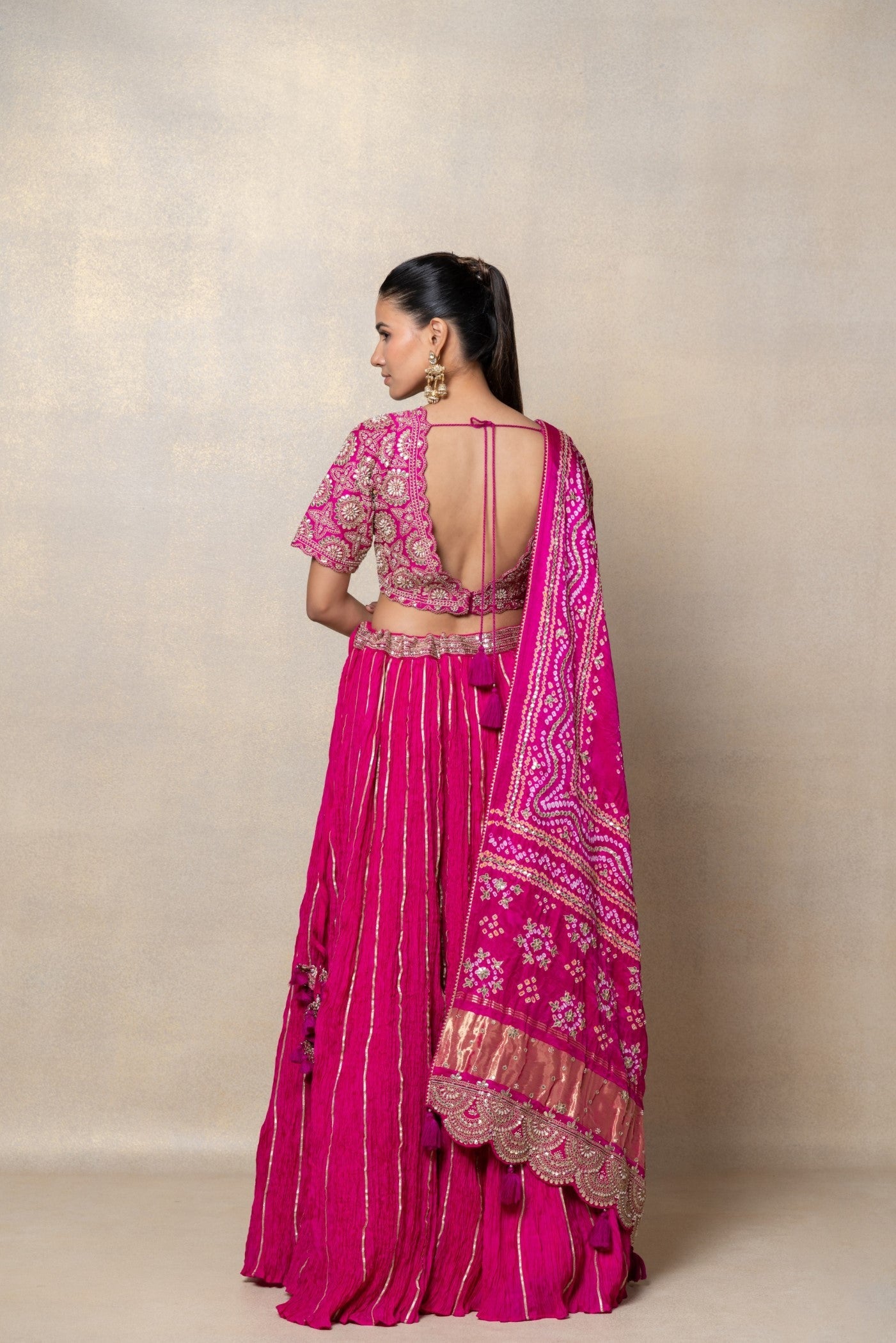 Magenta pink sequinned crepe silk lehenga set