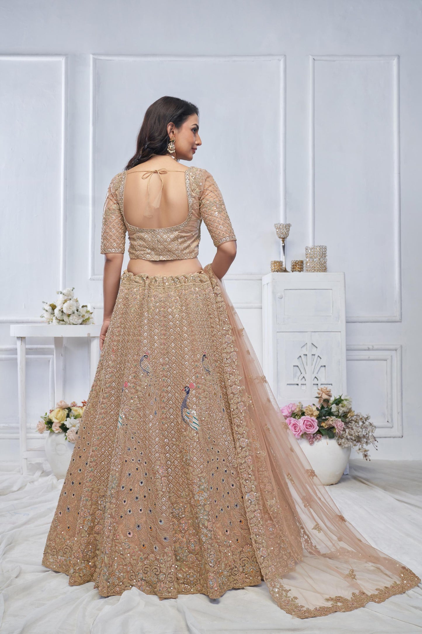 Beige Heavy Sequins & Zari Embroidered Soft Net Bridal Wear Lehenga