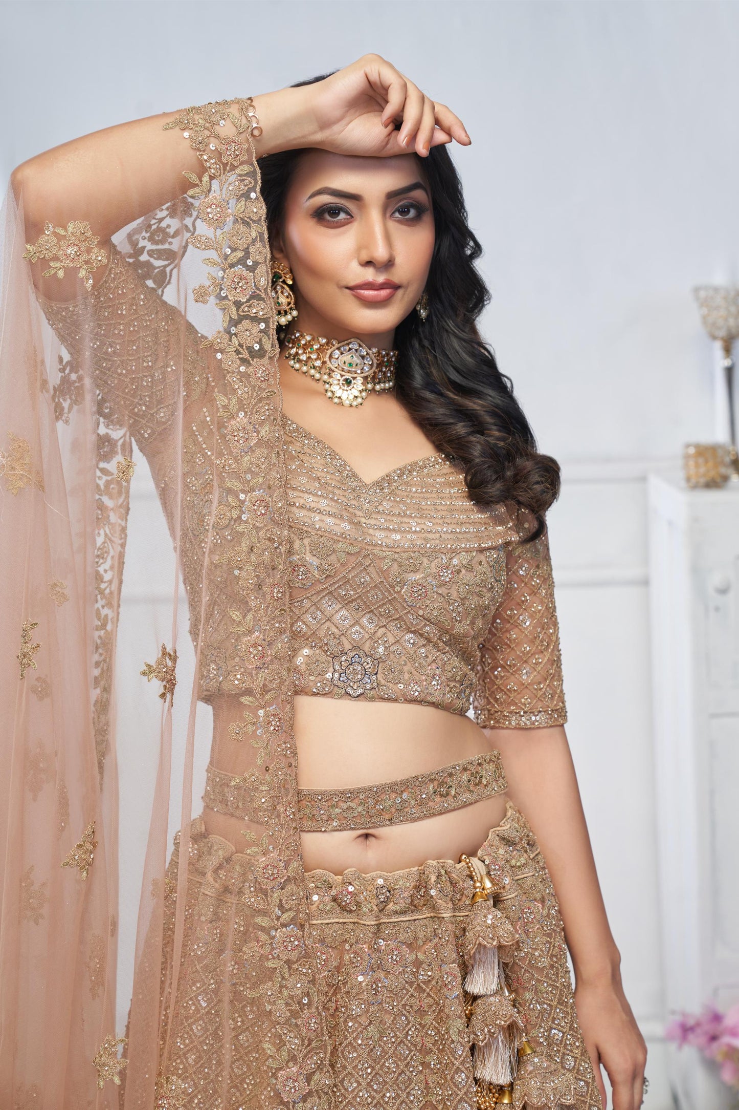 Beige Heavy Sequins & Zari Embroidered Soft Net Bridal Wear Lehenga