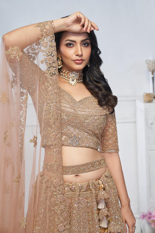 Beige Heavy Sequins & Zari Embroidered Soft Net Bridal Wear Lehenga