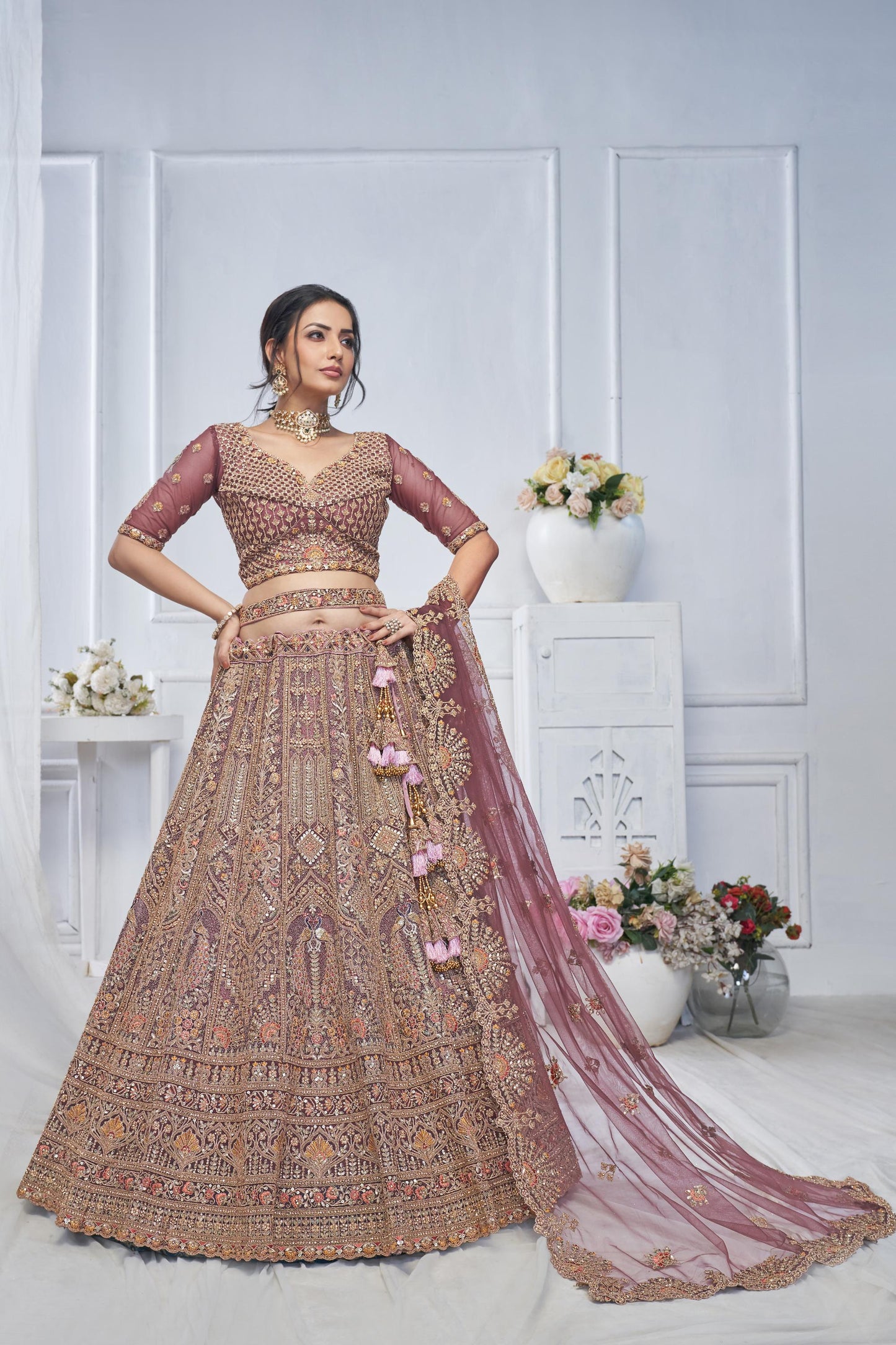 Onion Pink Soft Net With Paisley And Peacock Motifs Bridal Lehenga
