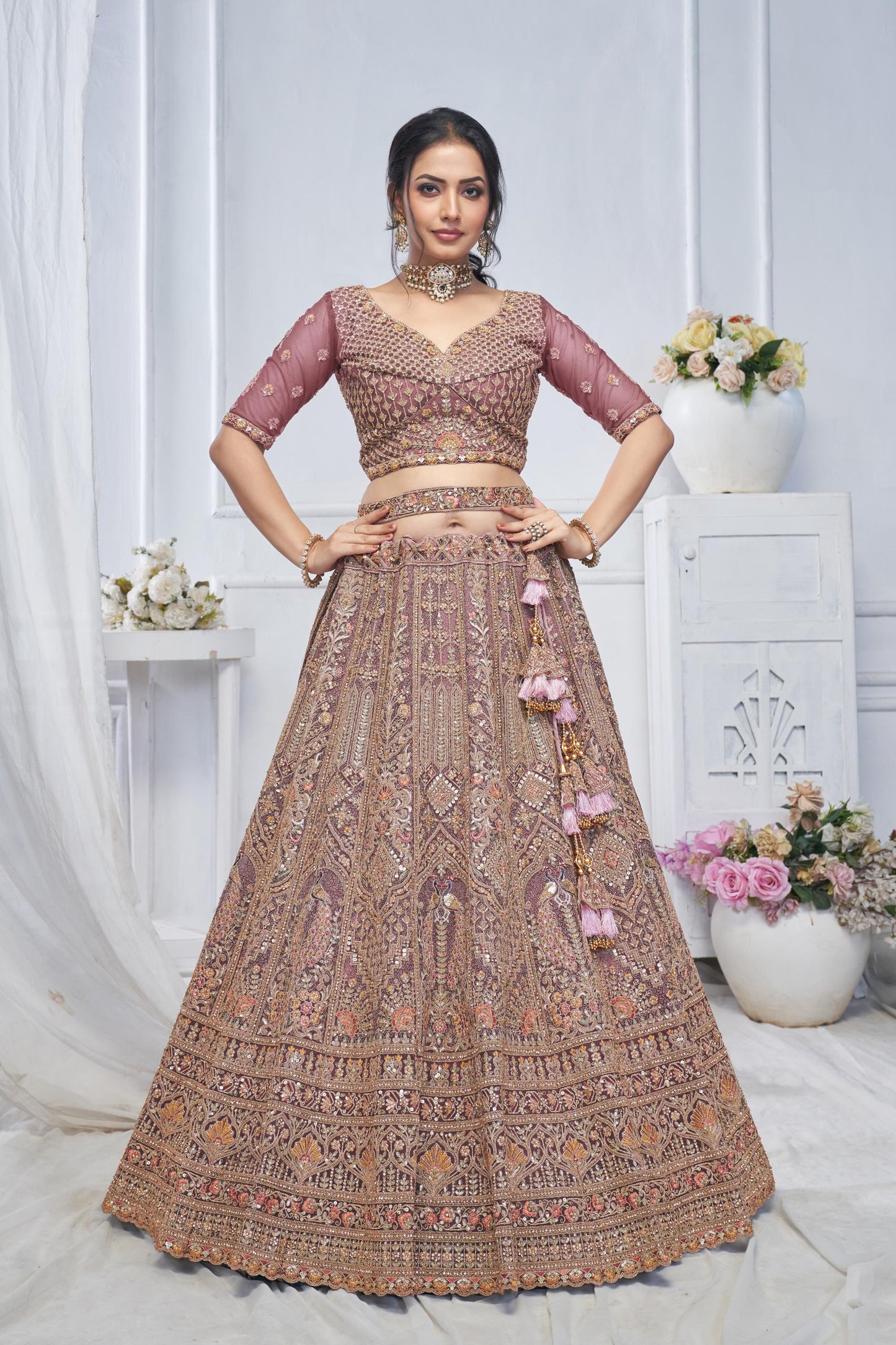 Onion Pink Soft Net With Paisley And Peacock Motifs Bridal Lehenga