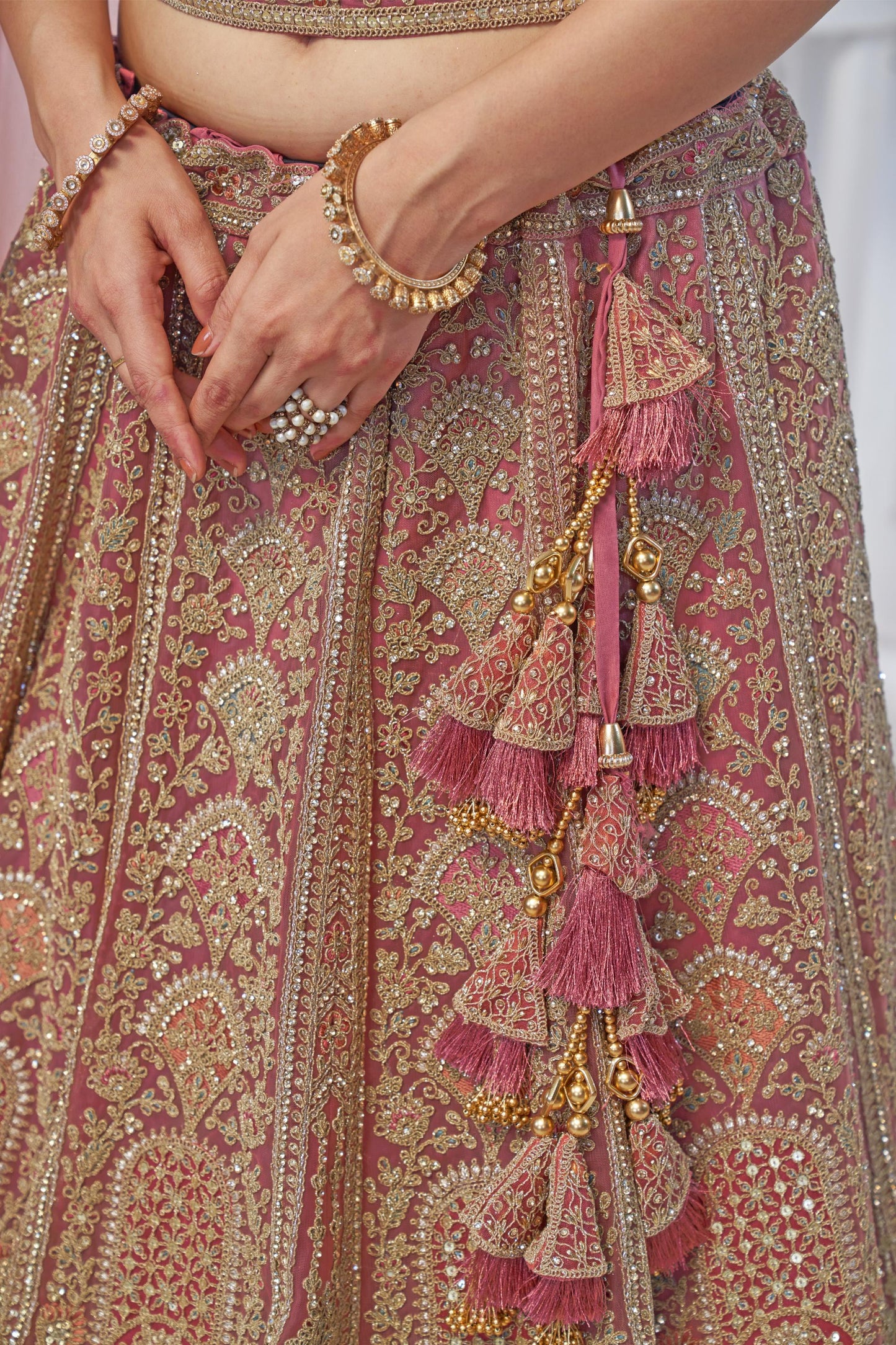 Onion Pink Motif Embroidered Soft Net Bridal lehenga