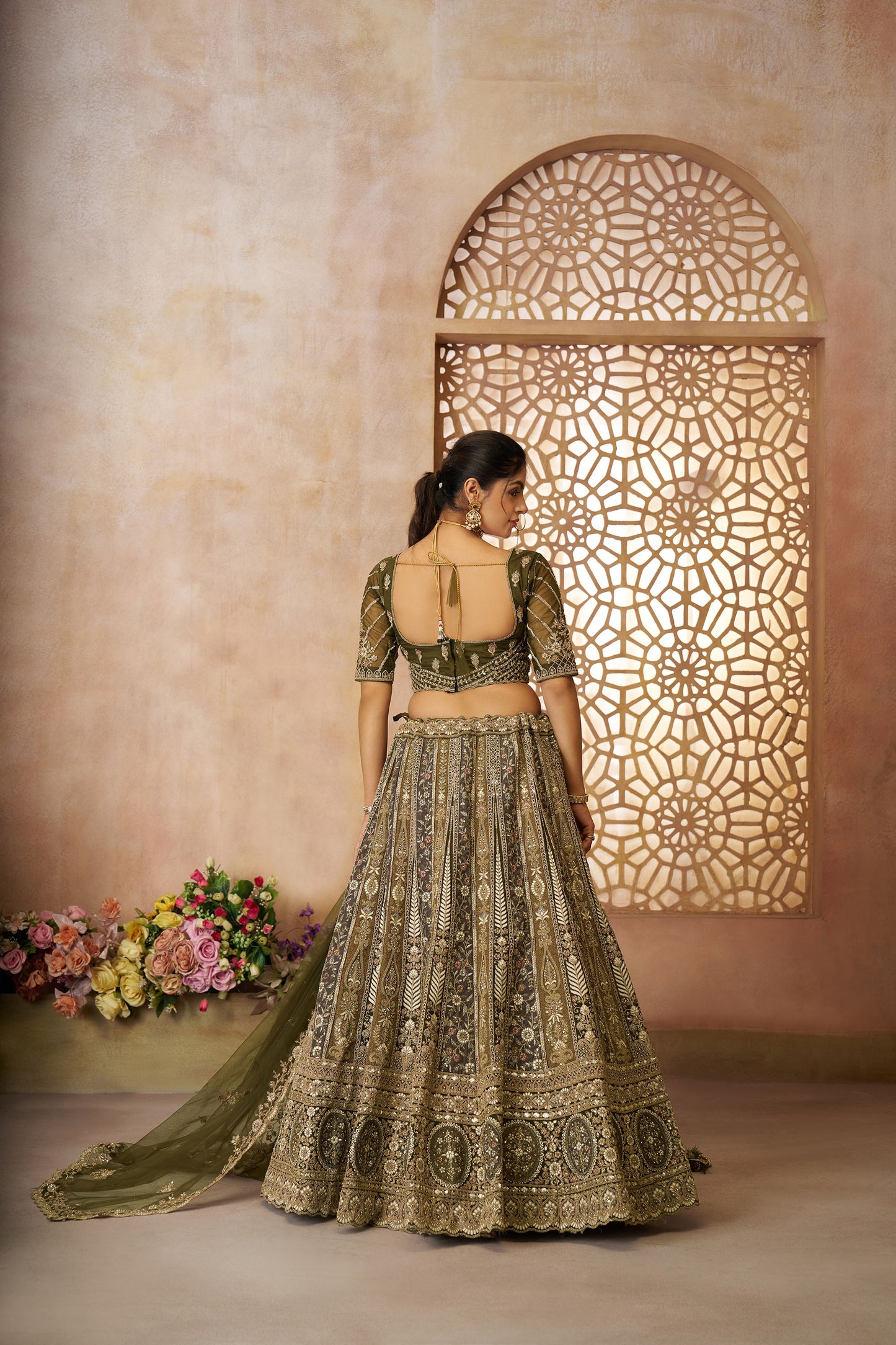 Grandeur Green Zari Embroidered Soft Net Bridal Lehenga
