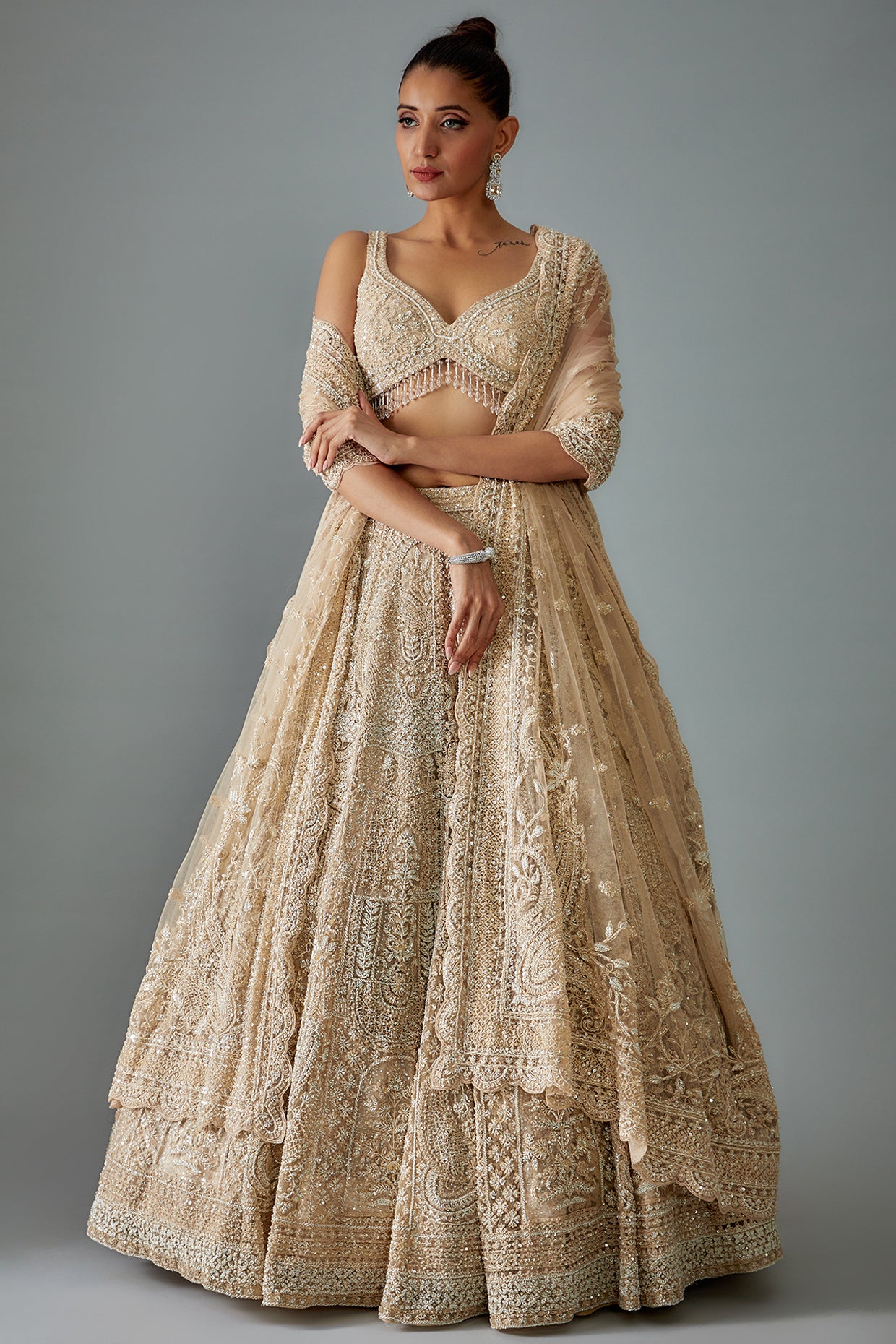 gold net hand embroidered lehenga set