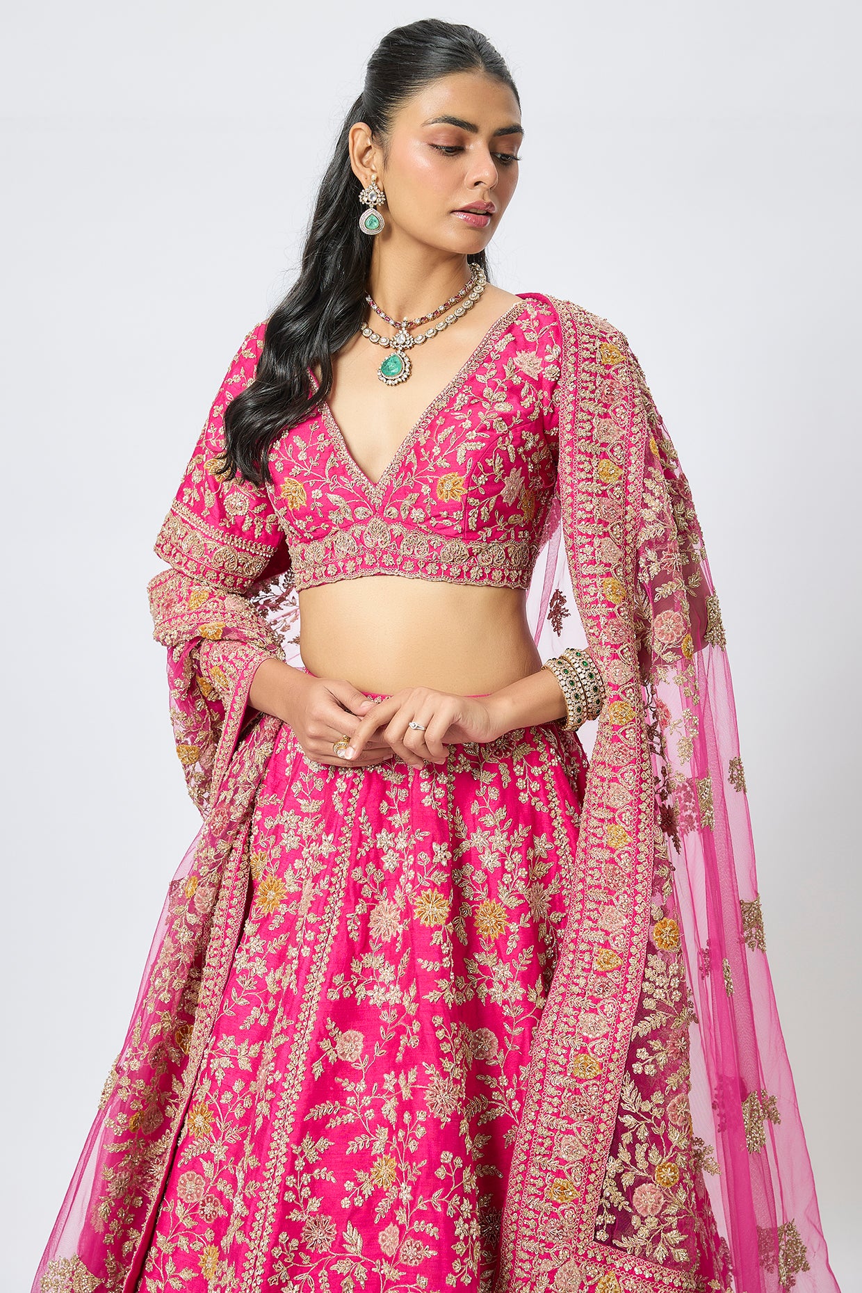 rani pink raw silk cutdana embroidered lehenga set