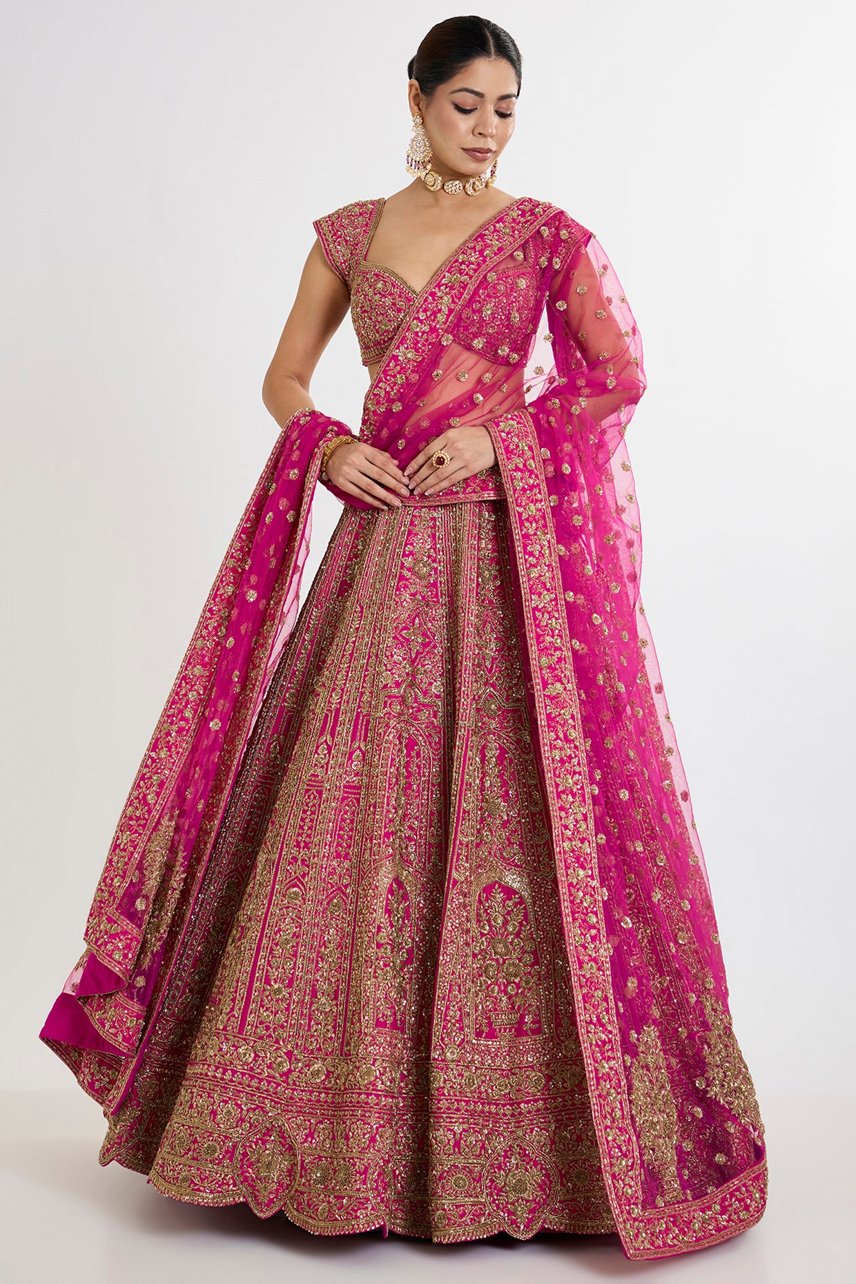 rani pink raw silk cutdana embroidered lehenga set