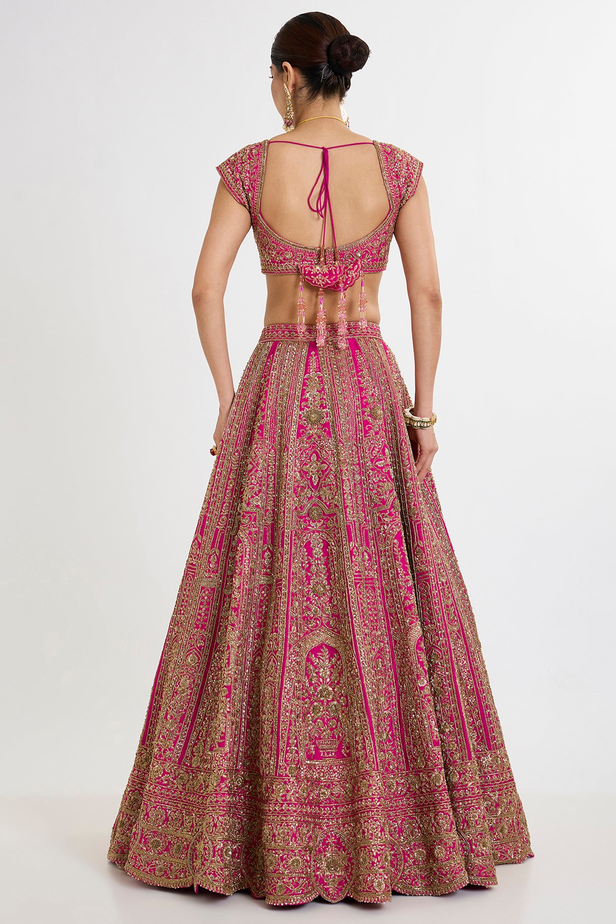 rani pink raw silk cutdana embroidered lehenga set