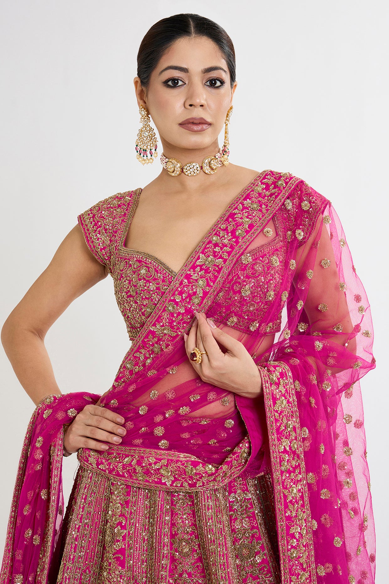 rani pink raw silk cutdana embroidered lehenga set