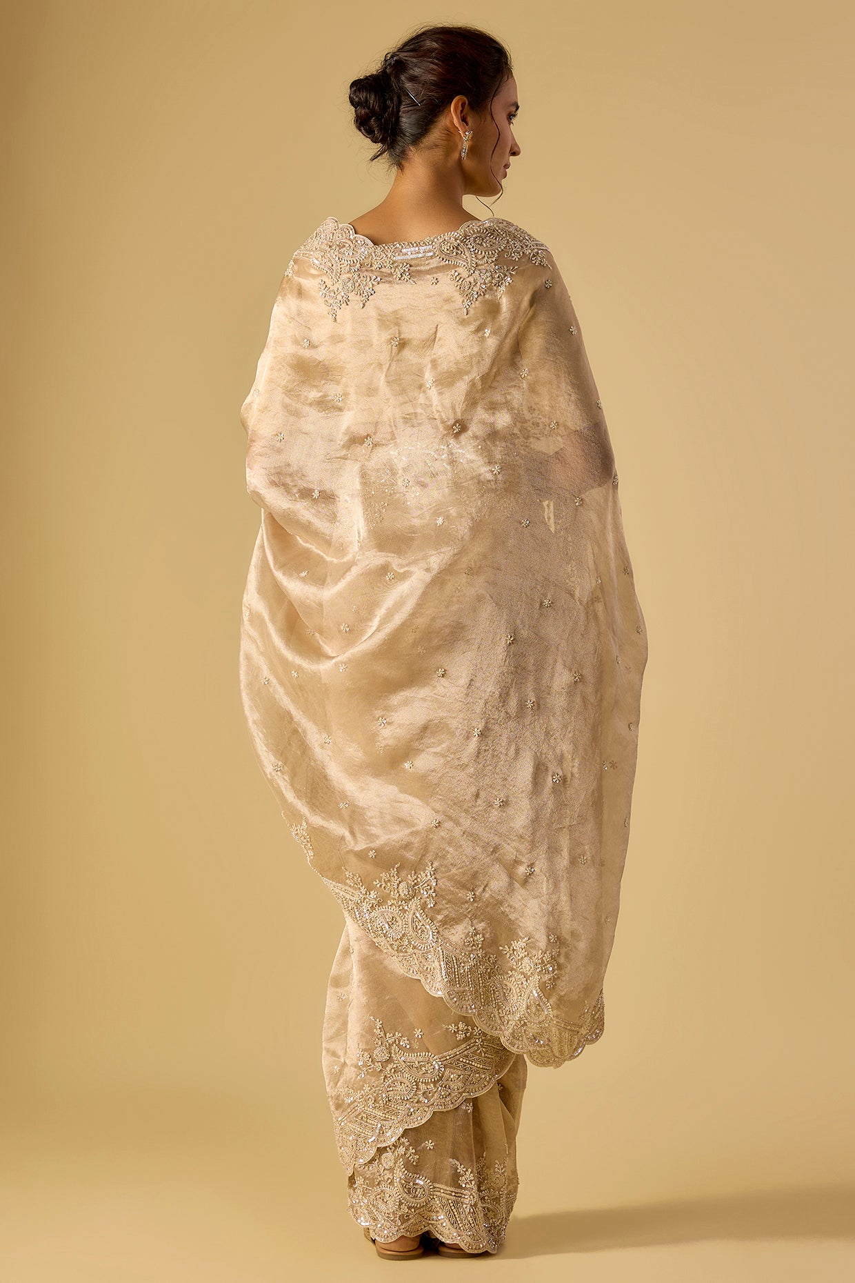 gold tissue hand & machine embroidered saree