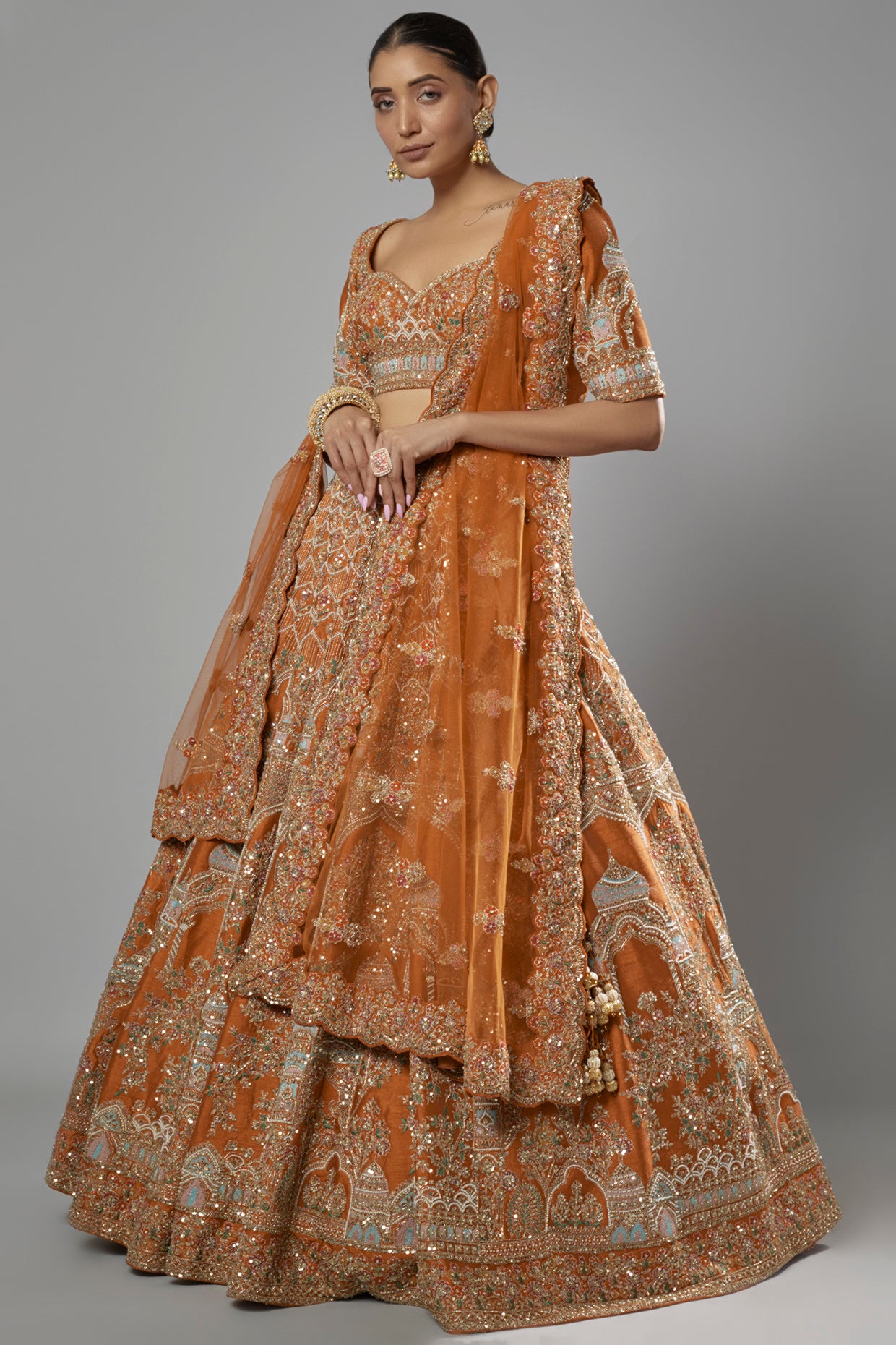 rust raw silk embroidered lehenga set