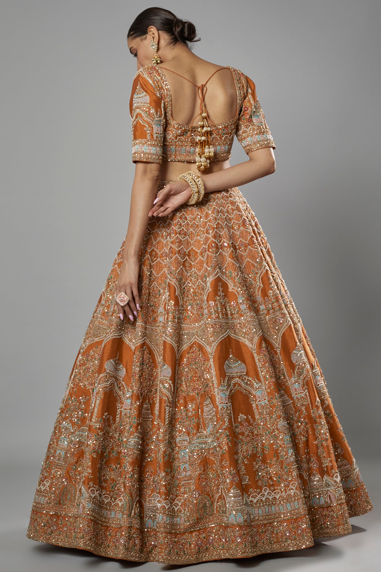 rust raw silk embroidered lehenga set