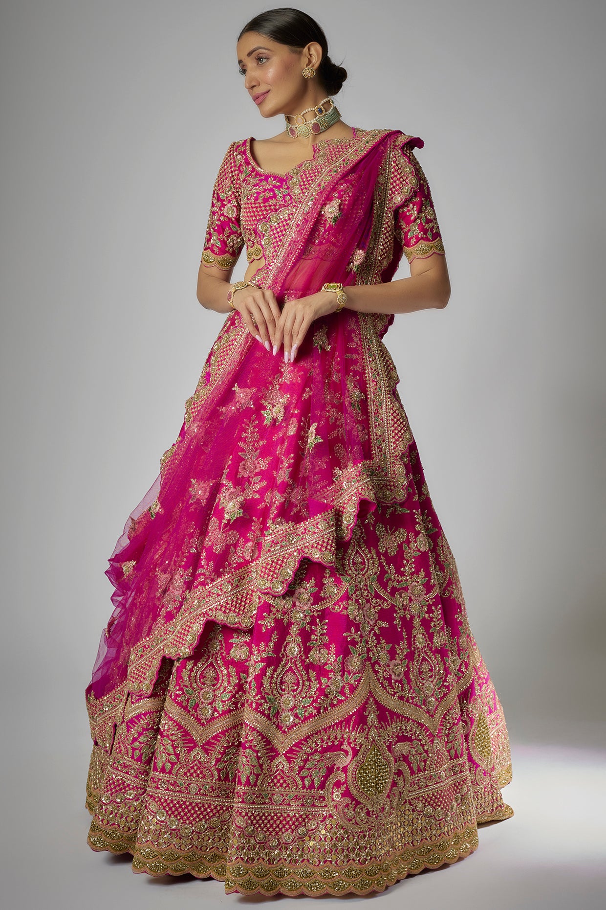 rani pink raw silk embroidered lehenga set